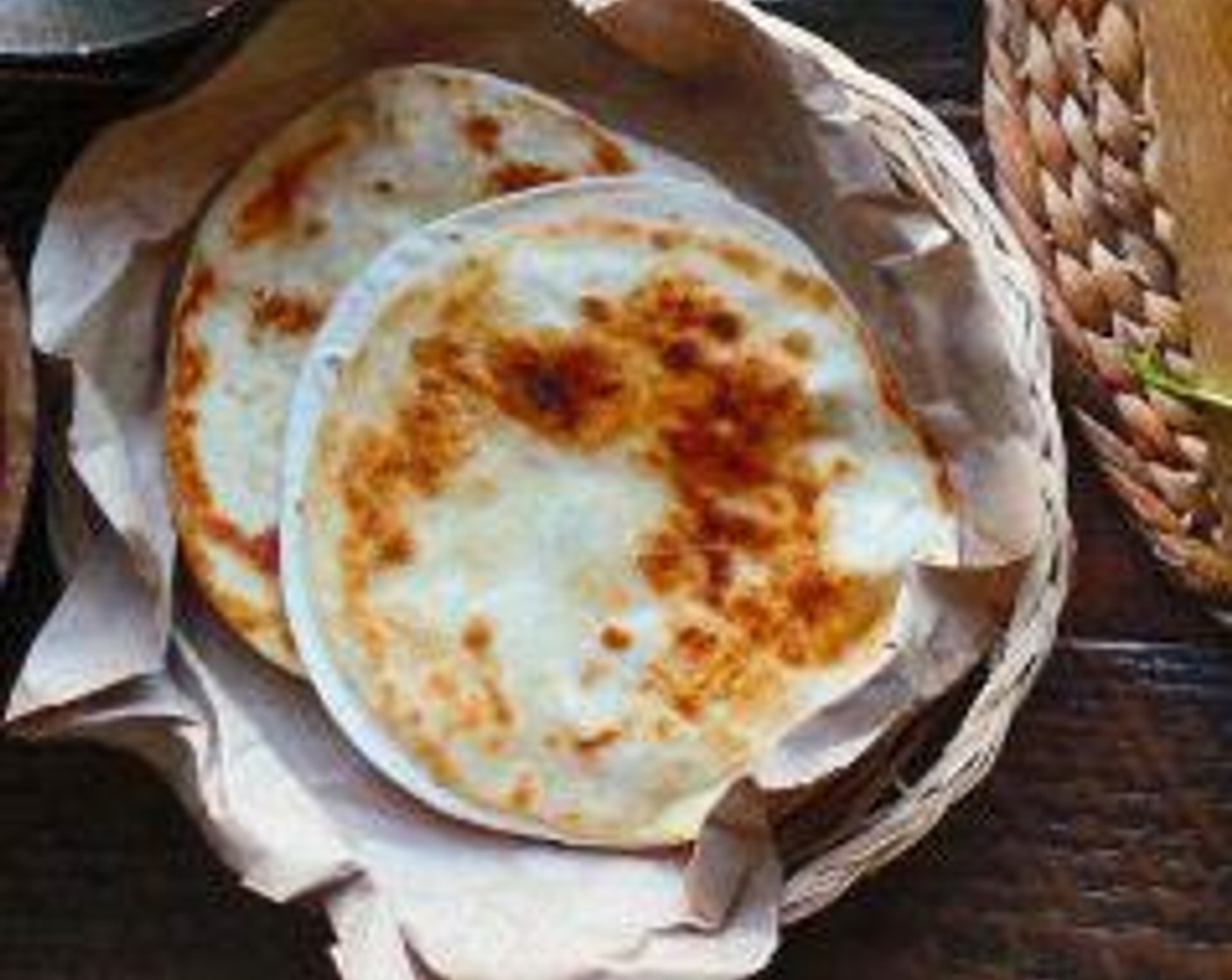 step 6 Heat a tablespoon more of oil in a separate pan and crisp the Flour Tortillas (8) for 2 minutes on each side, if desired.