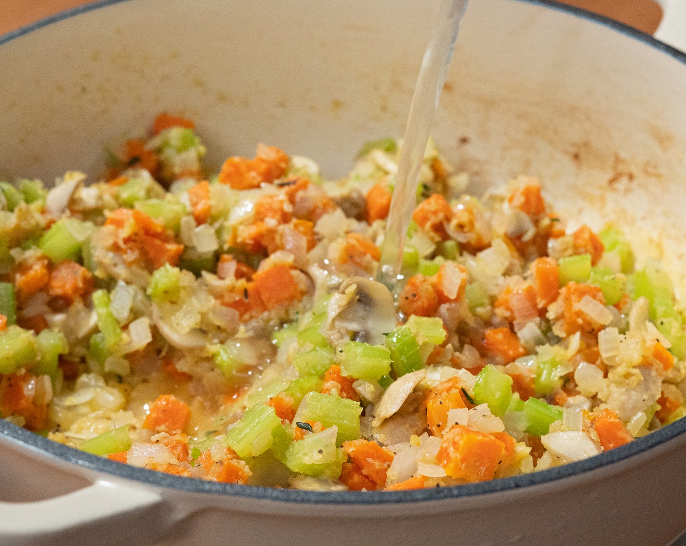 step 5 Pour in the Chicken Stock (5 cups). Stir occasionally until the soup is smooth and with no lumps.