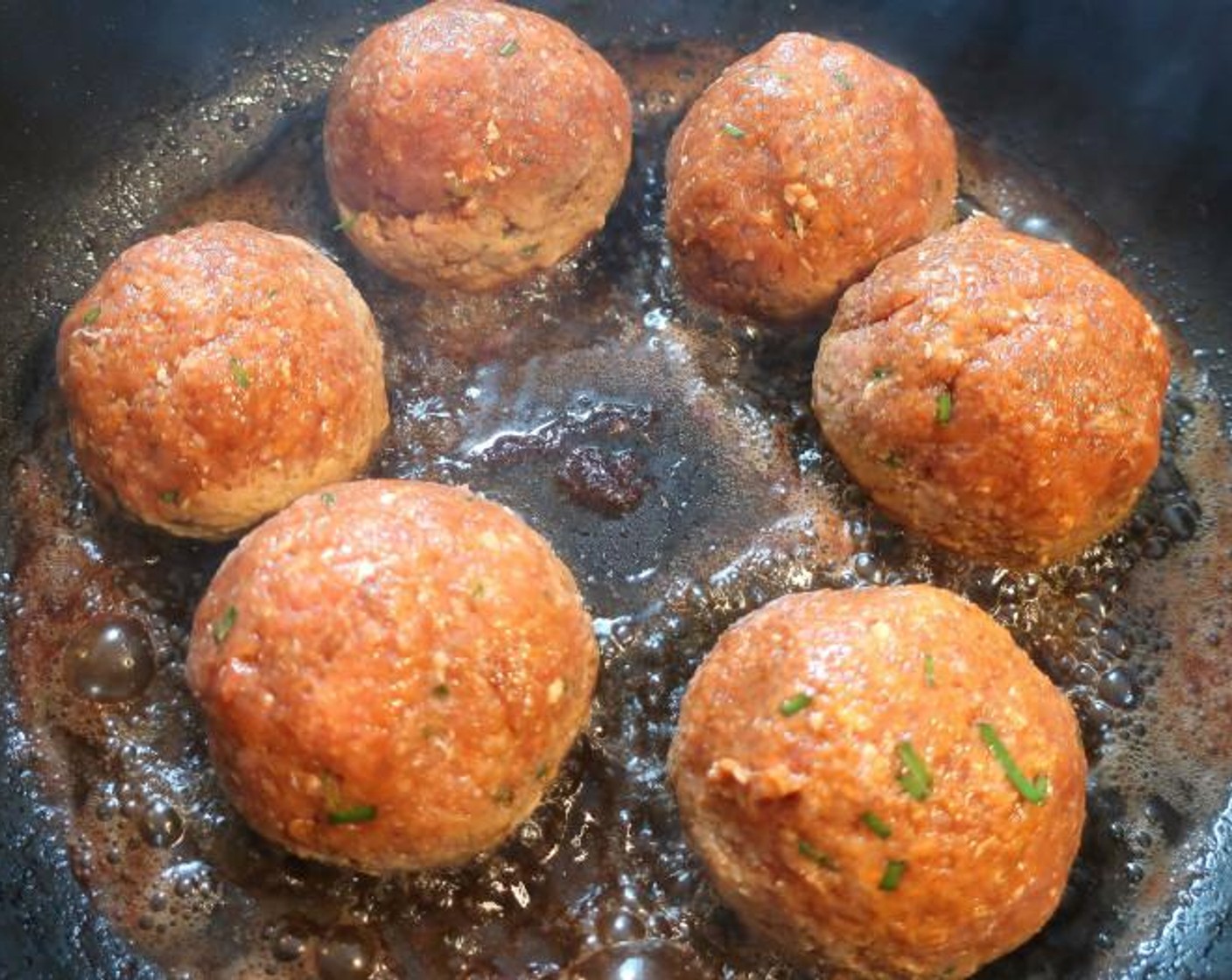 step 2 Shape into 6 large balls and brown in Extra-Virgin Olive Oil (2 Tbsp) on all sides.