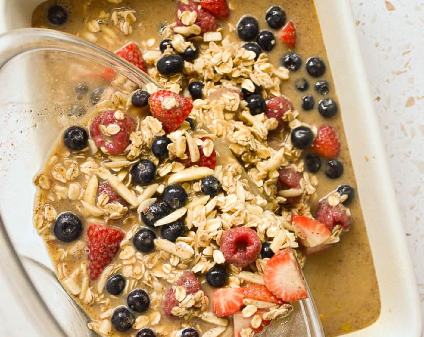 step 6 Pour mixture into a greased 9×13 baking dish. Sprinkle the crispy topping evenly over the top.