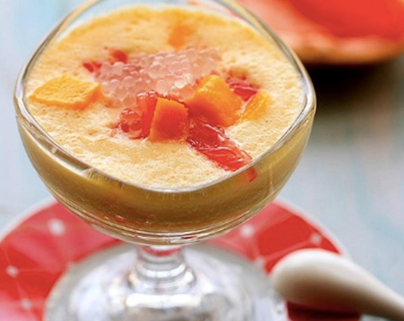 step 5 Pour the smoothie mixture into the serving bowls. Add cooked sago and top with extra mango chunks and pomelo. Serve and enjoy!