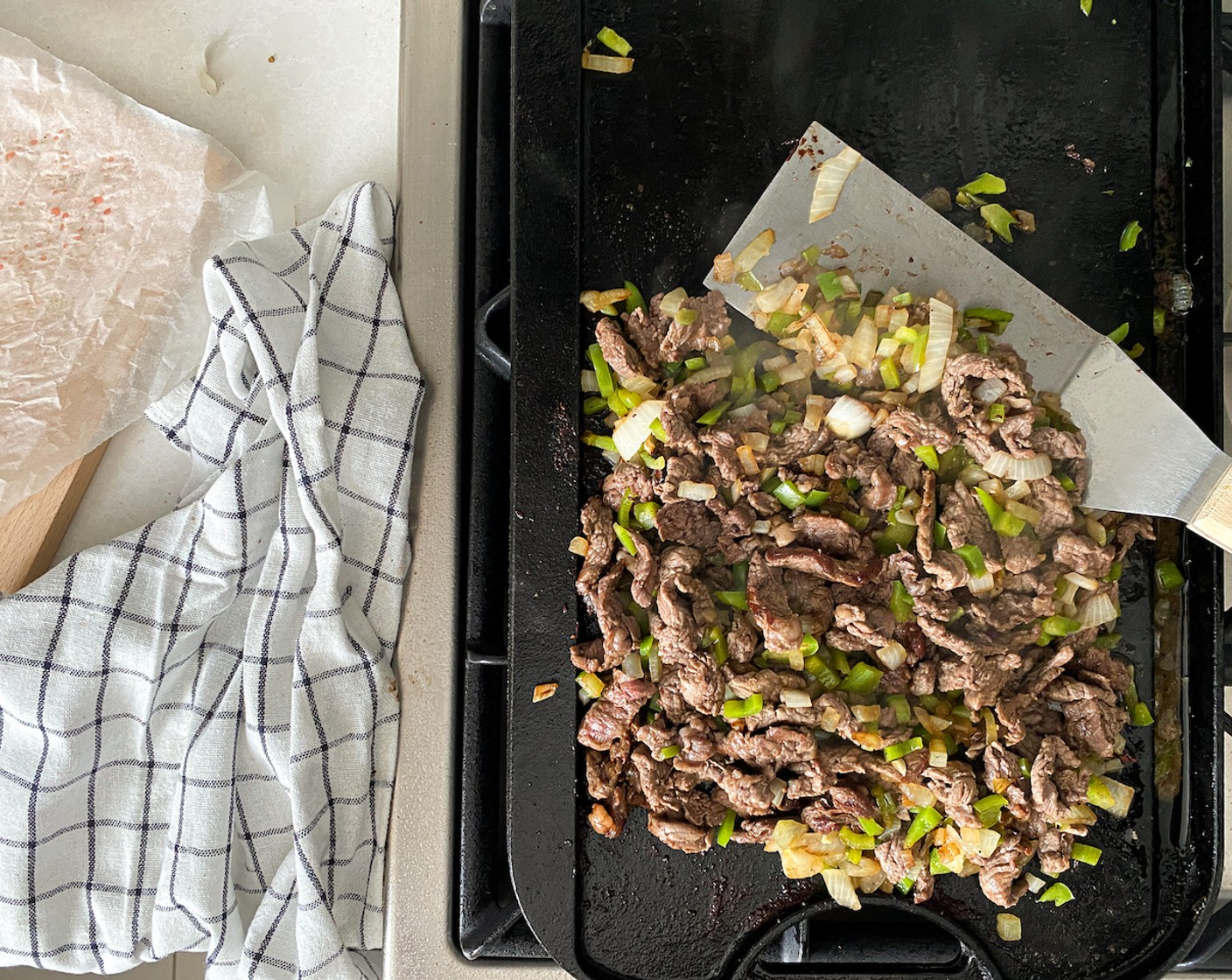 step 5 Mix beef, peppers and onions together. Season once more to taste.