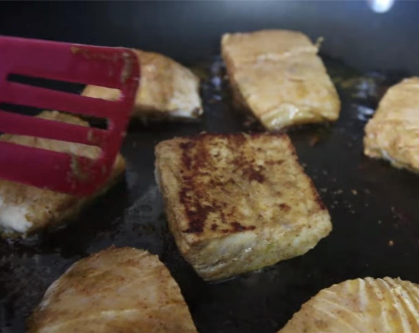 step 11 Place a large pan over medium high heat. Cook the marinated fish without moving until the underside of the fish is browned, and the sides are white and opaque, about 3 minutes.