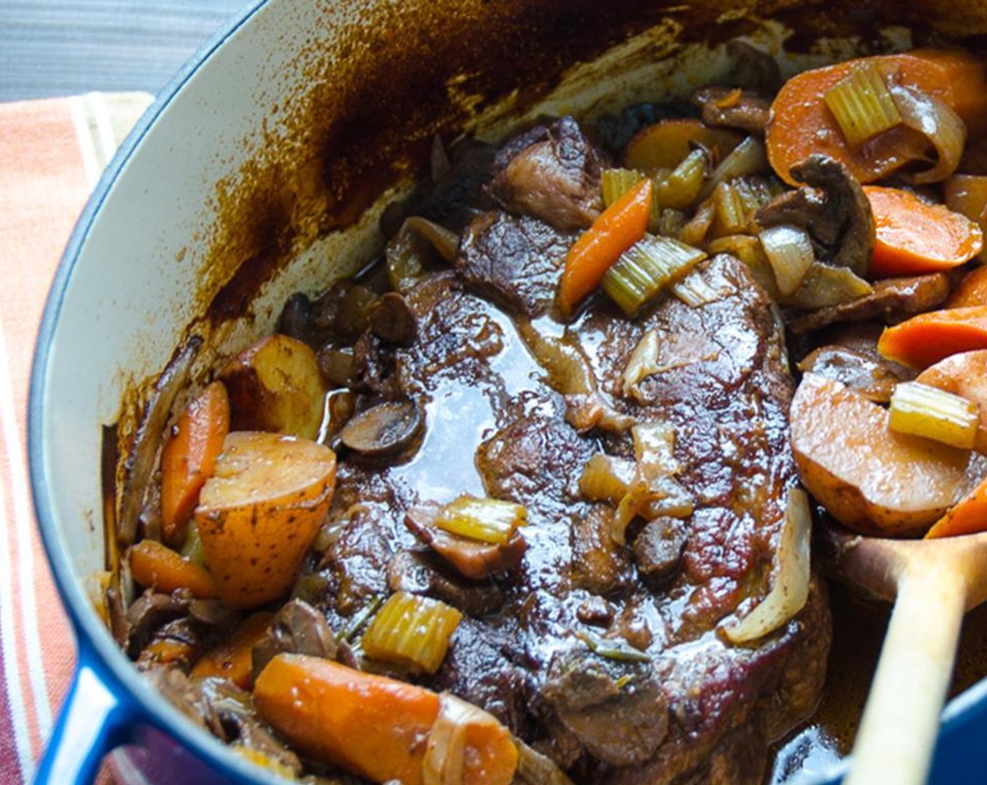 step 9 Bring to a boil and cover. Transfer the covered pot to the oven and braise for 2 1/2-3 hours until meat is tender.