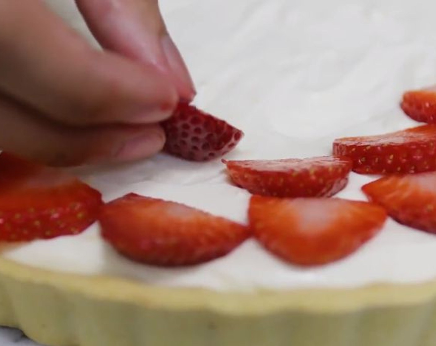 step 8 Add cheesecake filling to cooled crust and spread evenly. Top with sliced strawberry. Refrigerate until ready to serve. The more time it has in the fridge, the better it tastes.