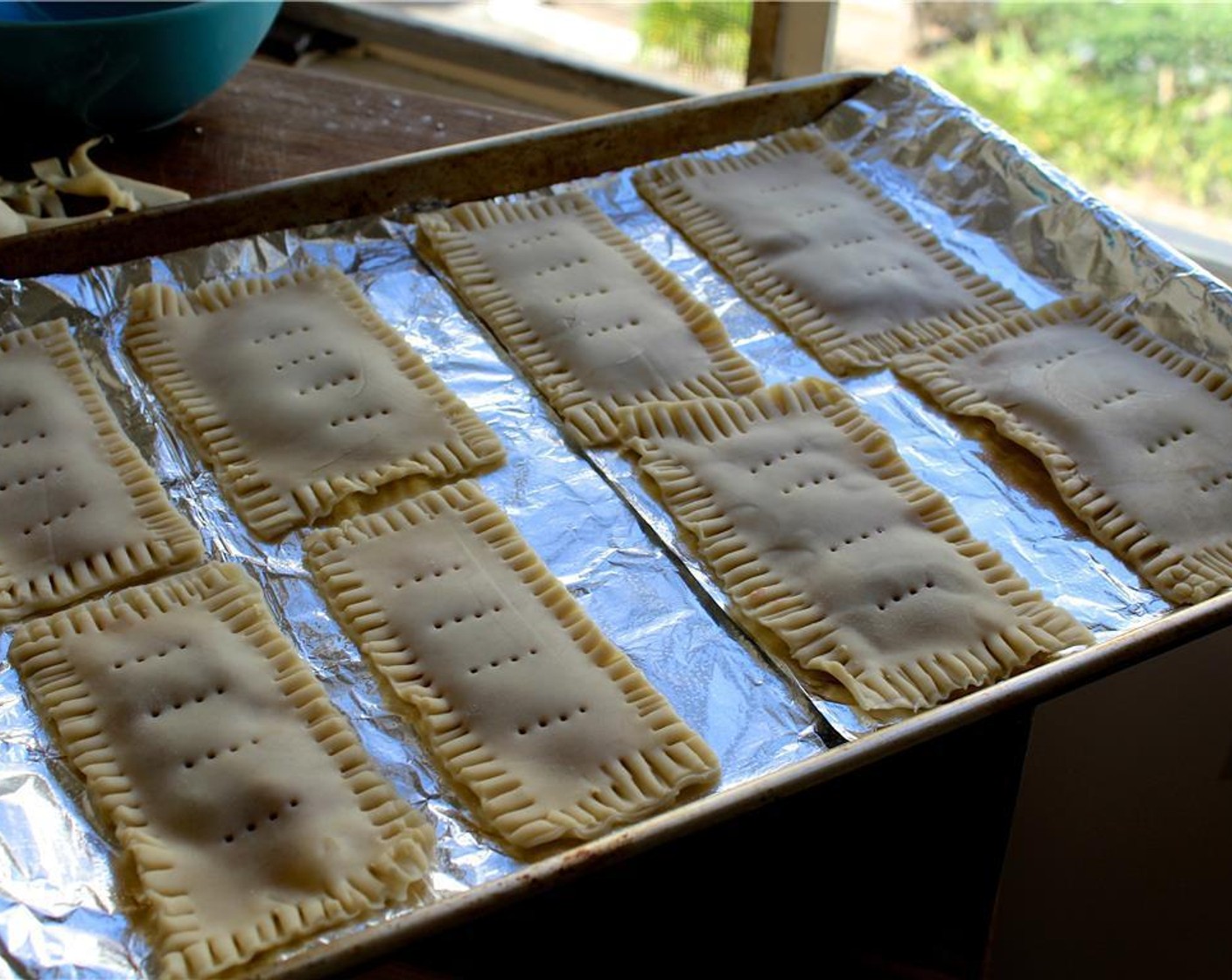 step 6 Repeat the entire process with the other sheet of prepared pie crust, if desired. Arrange the tarts on a foil or parchment lined baking sheet.