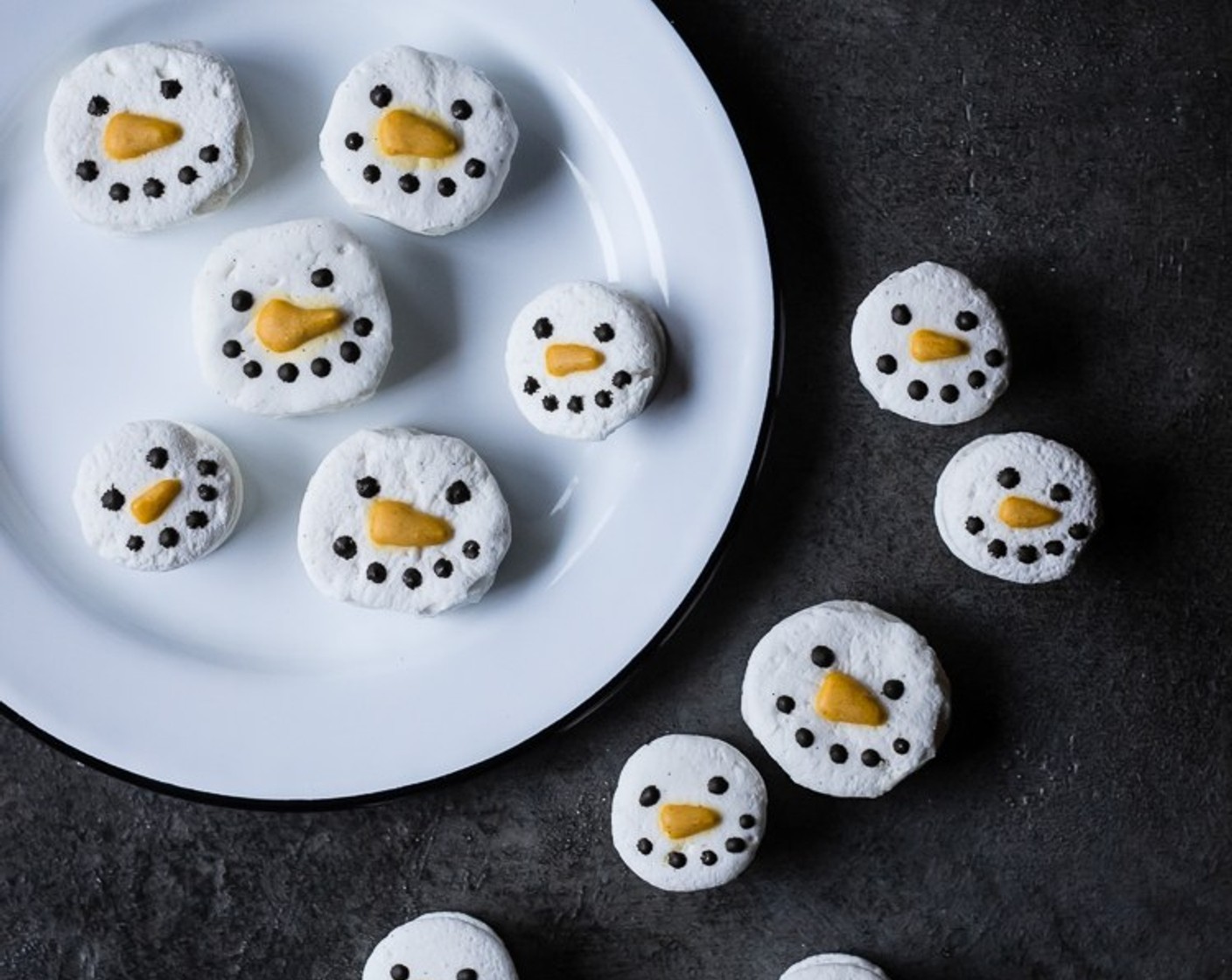 step 9 Allow chocolate snowman faces to set at room temperature before serving.