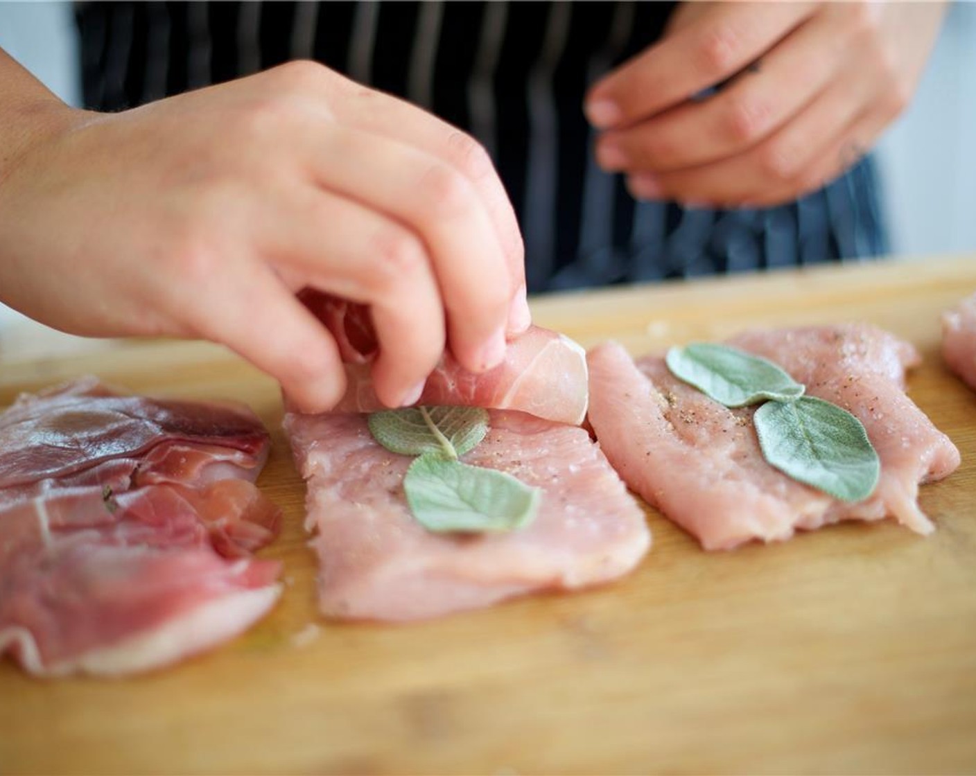 step 4 Evenly distribute Fresh Sage (1/4 cup) leaves on top of each cutlet, approximately 2 per, and place 1 slice of Prosciutto (1 pckg) on top. Press the prosciutto into the turkey to make the sage and prosciutto stick.