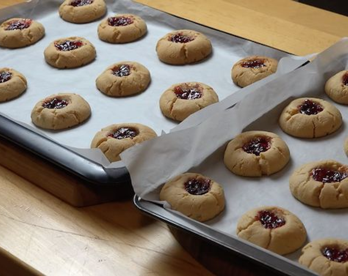 step 8 Once they've all been filled with jam place into preheated oven and bake for 12-15 minutes, or until nice and golden around the edges.