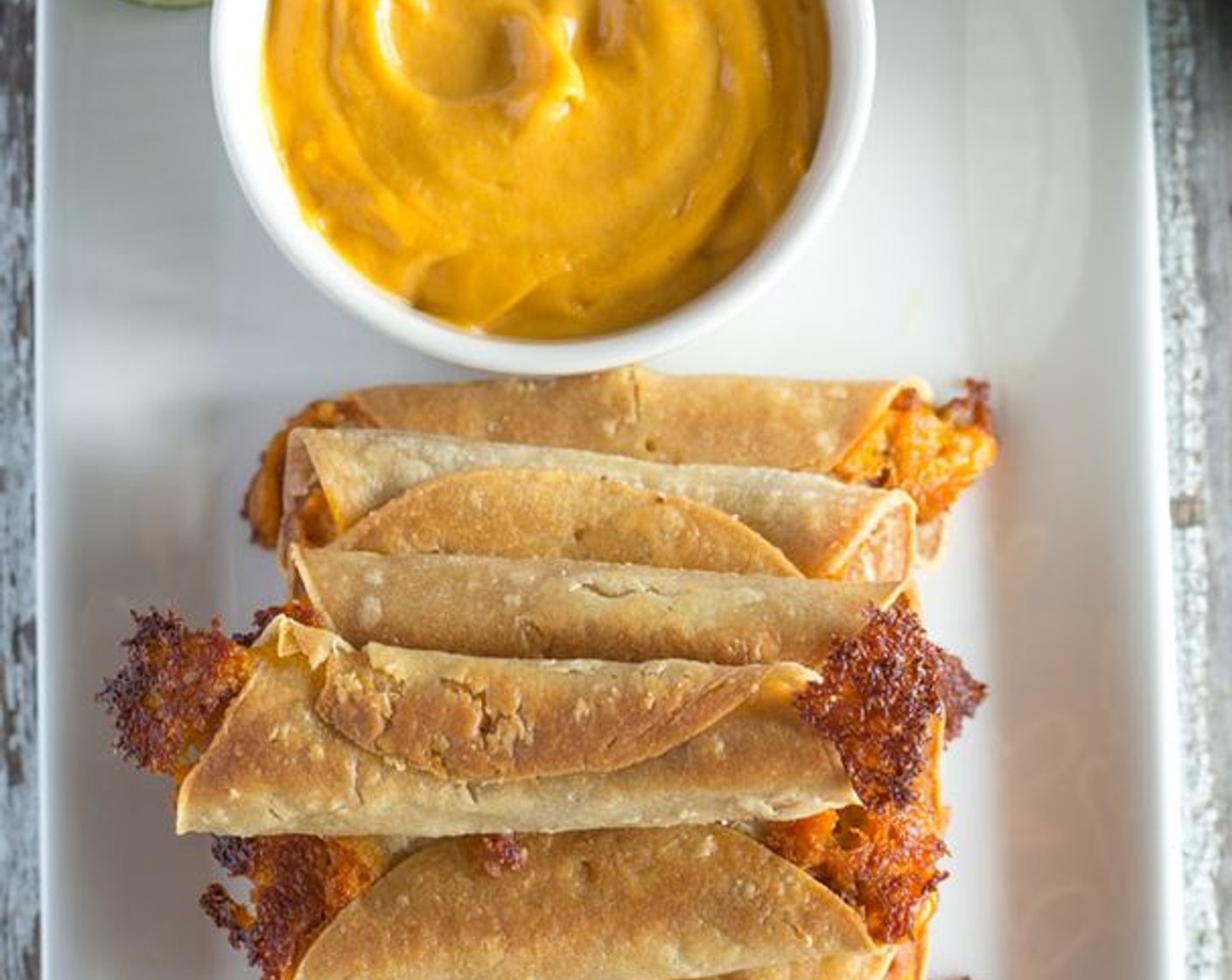 Baked Taquitos with Creamy Salsa and Guacamole