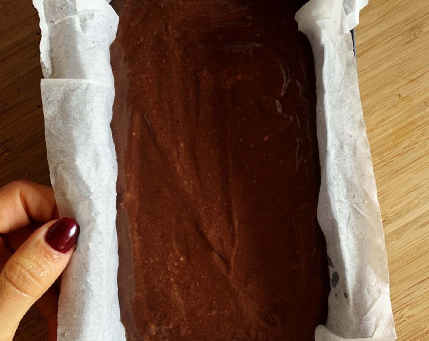 step 7 Bake in your preheated oven at 350 degrees F (180 degrees C) for 45 minutes. If the top is getting too dark, lower down the temperature to 325 degrees F (160 degrees C).