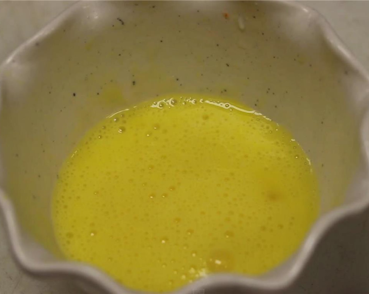 step 5 Crack an Eggland's Best Classic Egg (1) and beat it until it becomes runny.