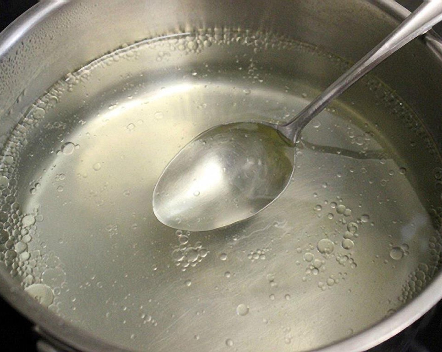 step 5 In a medium saucepan, combine Water (4 1/2 cups), White Granulated Sugar (1 cup), Distilled White Vinegar (1 cup), Salt (2 1/2 Tbsp), Olive Oil (1/2 cup), and bring to a boil.
