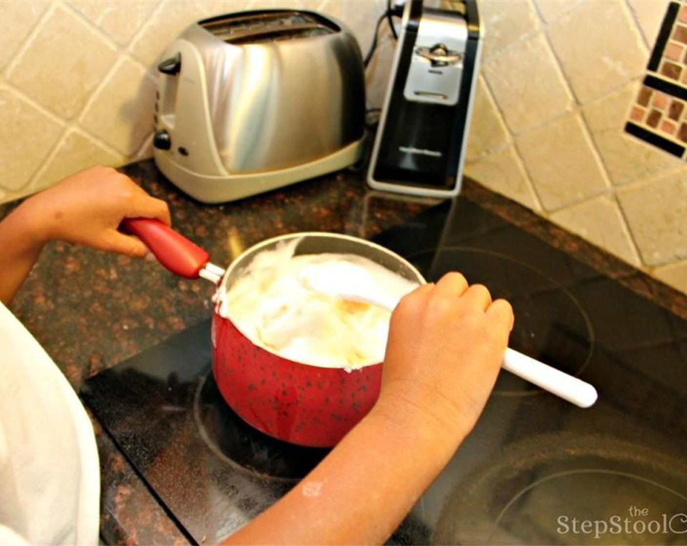 step 11 Fold the foamy egg white mixture with the vanilla batter.