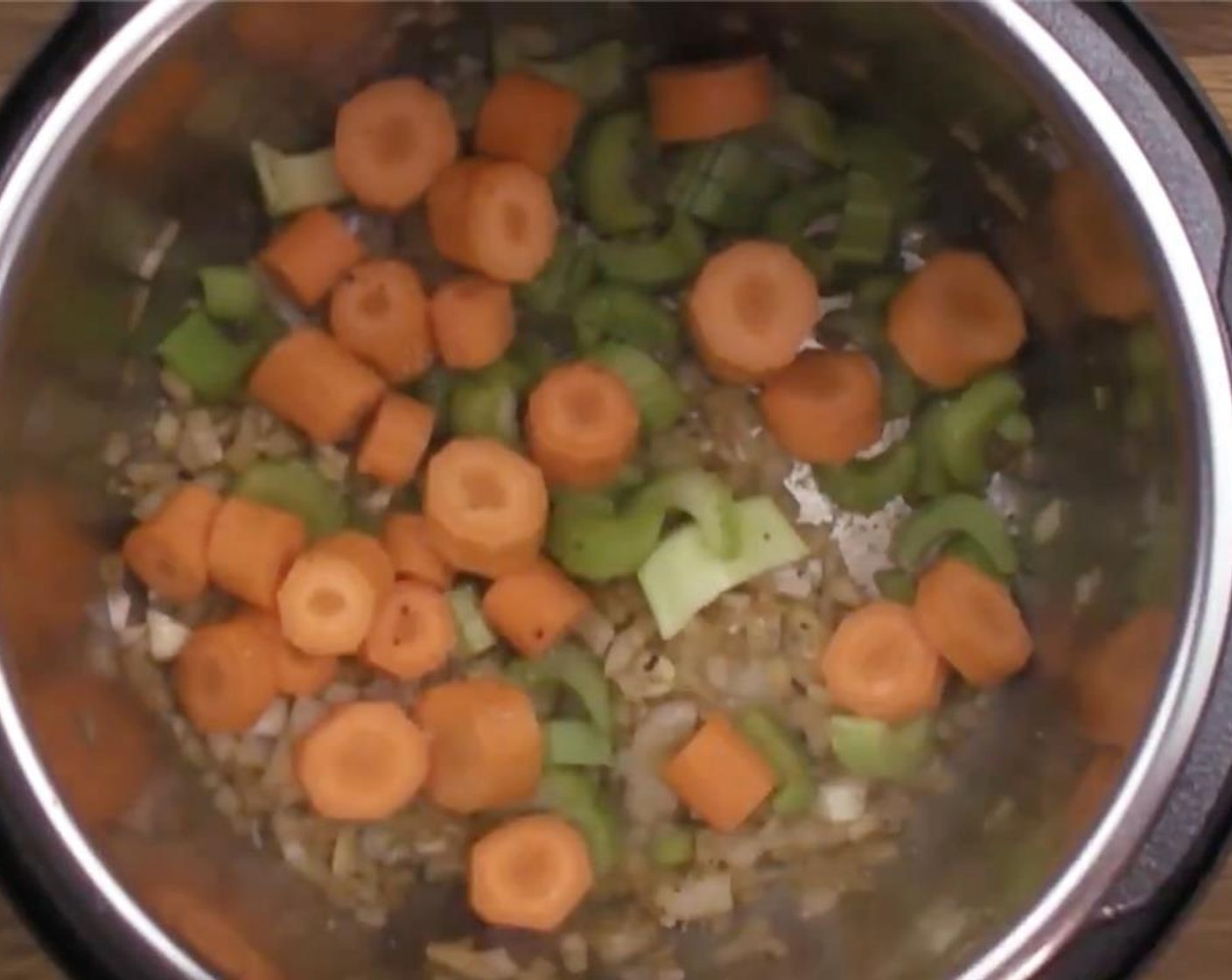 step 6 Add chopped Celery (2 stalks), chopped Carrots (2), and a pinch of Kosher Salt (to taste) and Ground Black Pepper (to taste), then cook for 2 minutes.