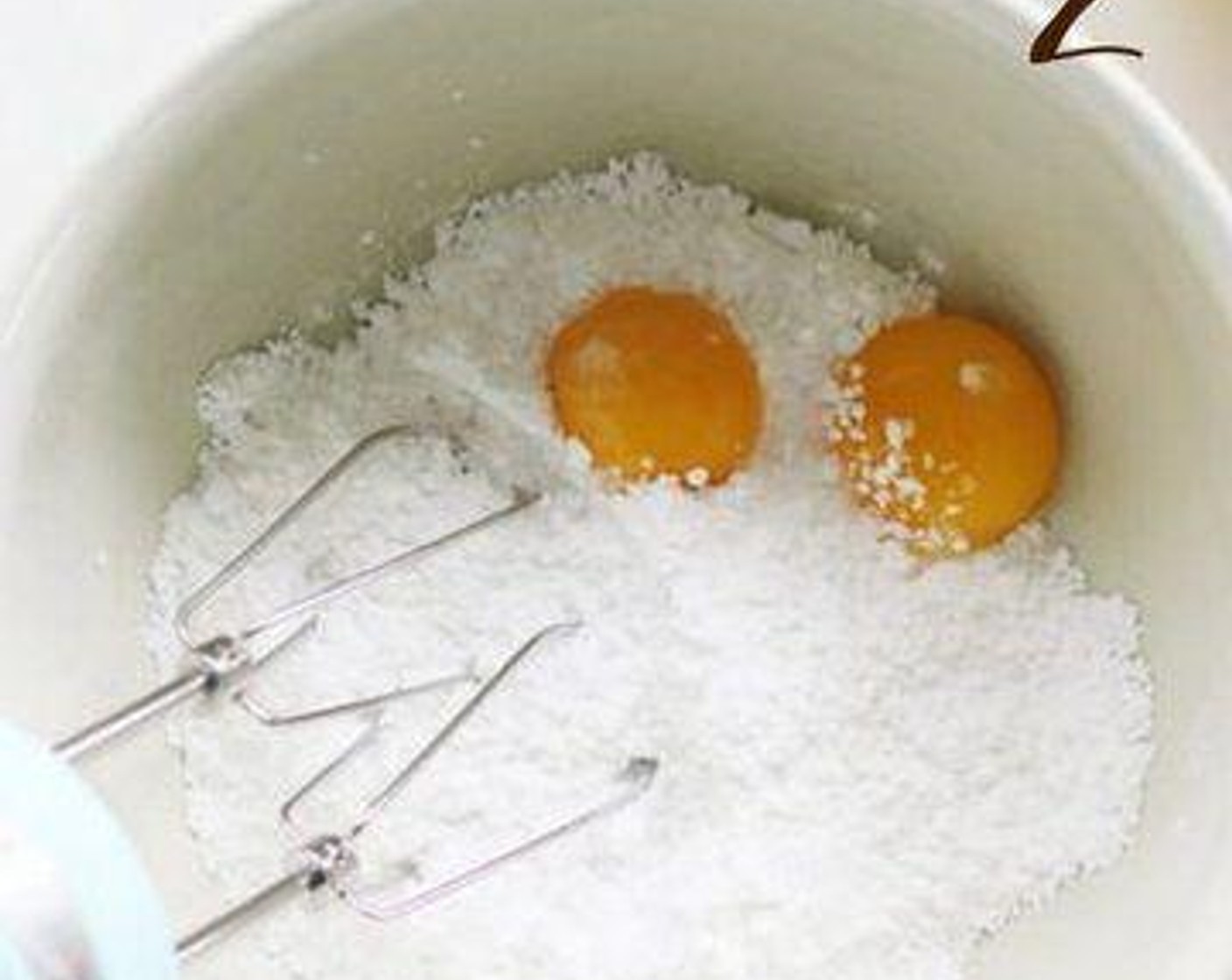 step 3 In a large bowl, beat the Powdered Confectioners Sugar (1 1/2 cups) and Eggland's Best Classic Eggs (2) together until smooth. Slowly drizzle in the Butter (1 cup) while beating on high speed.