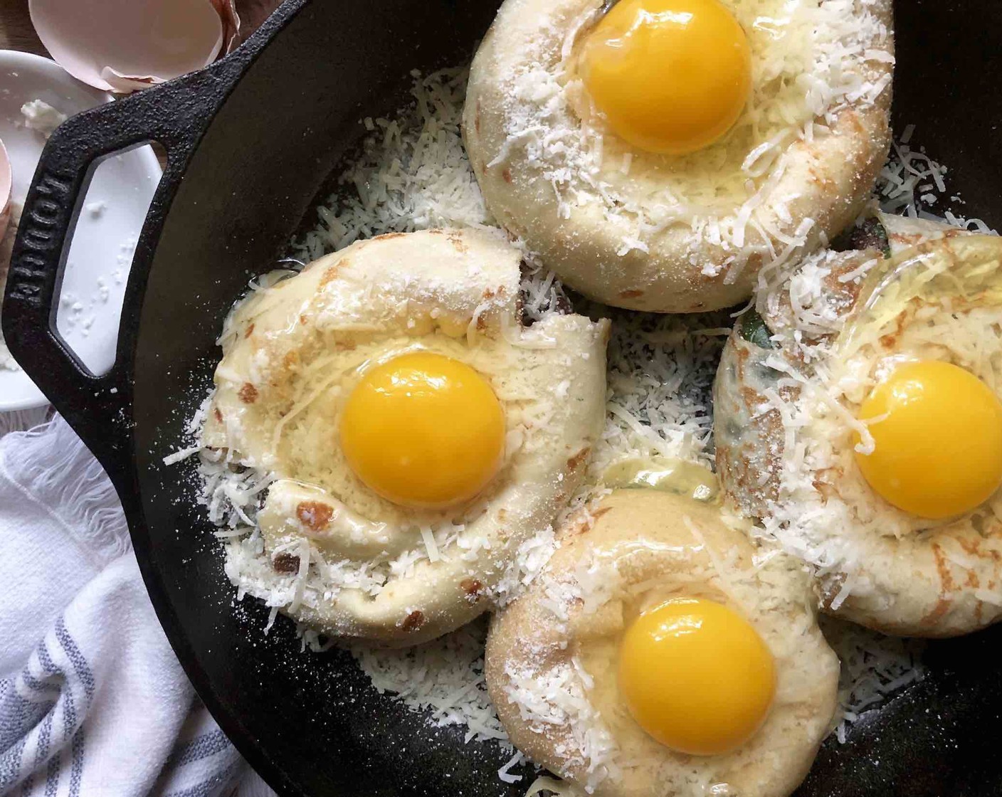 step 14 Carefully crack one Farmhouse Eggs® Large Brown Eggs (4) into each divot.