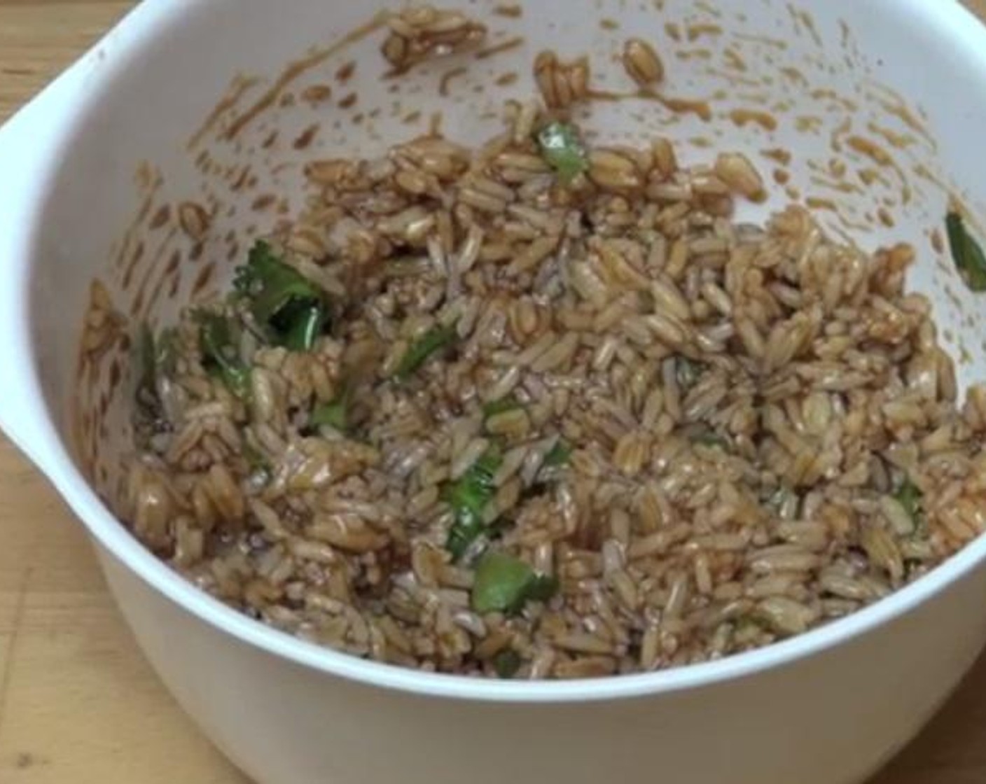 step 1 Into a mixing bowl, mix together the cooked White Rice (2 2/3 Tbsp), Soy Sauce (2 Tbsp), Simply Organic Garlic Powder (1 tsp), Ground Coriander (to taste), and Sweet Chili Sauce (1/2 cup).