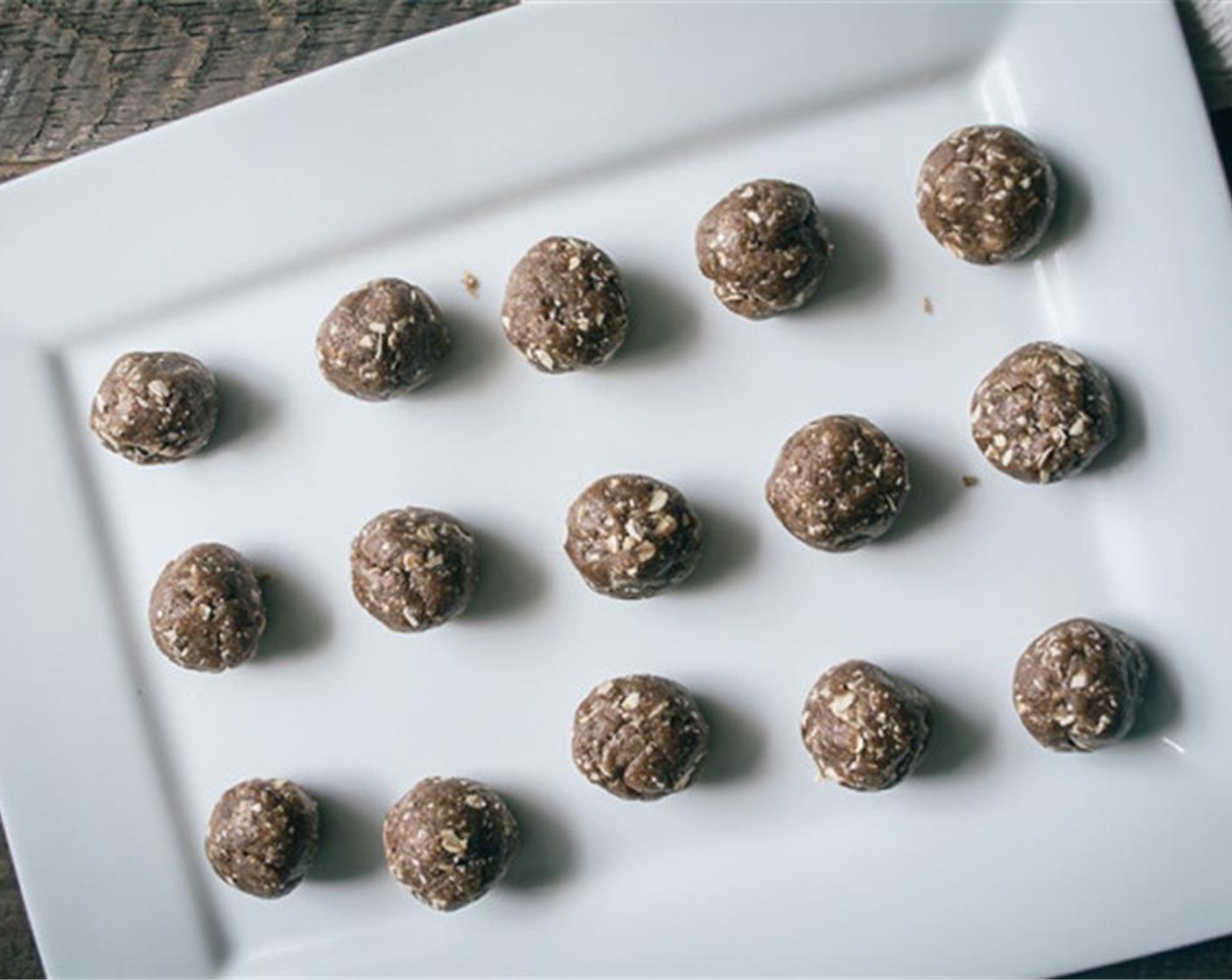step 2 Pulse 4 to 5 times, then hold and run for 15 to 20 seconds or until all ingredients have blended well to create a cookie dough-like texture. Line baking sheet with wax paper, roll the cookie dough into 16 small balls, approximately 1-inch in diameter.