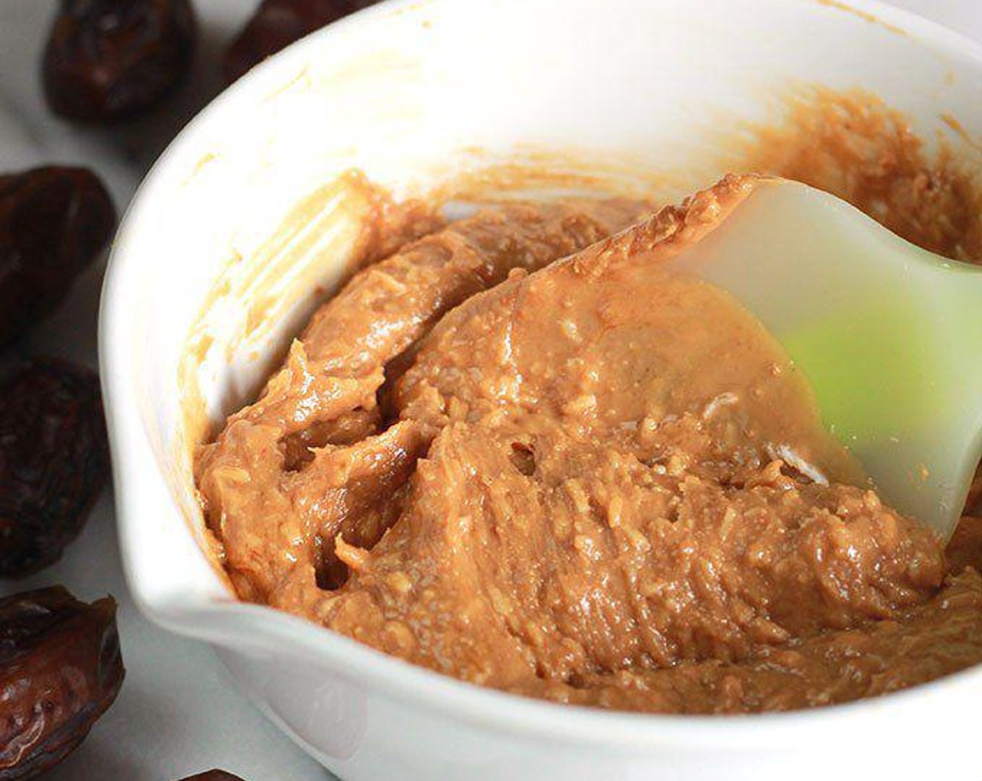 step 1 In a medium bowl, combine Nut Butter (1 cup) and Unsweetened Coconut Flakes (1/4 cup). Set aside.