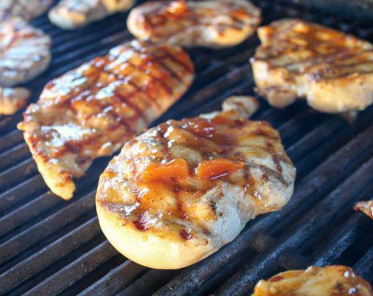 step 6 Toward the end of cooking the second side, baste the chicken generously with the prepared apricot sauce. Flip, baste the other side, and cook for a minute or two. Repeat as needed until the chicken is cooked to an internal temperature of 165 degrees F (75 degrees C).