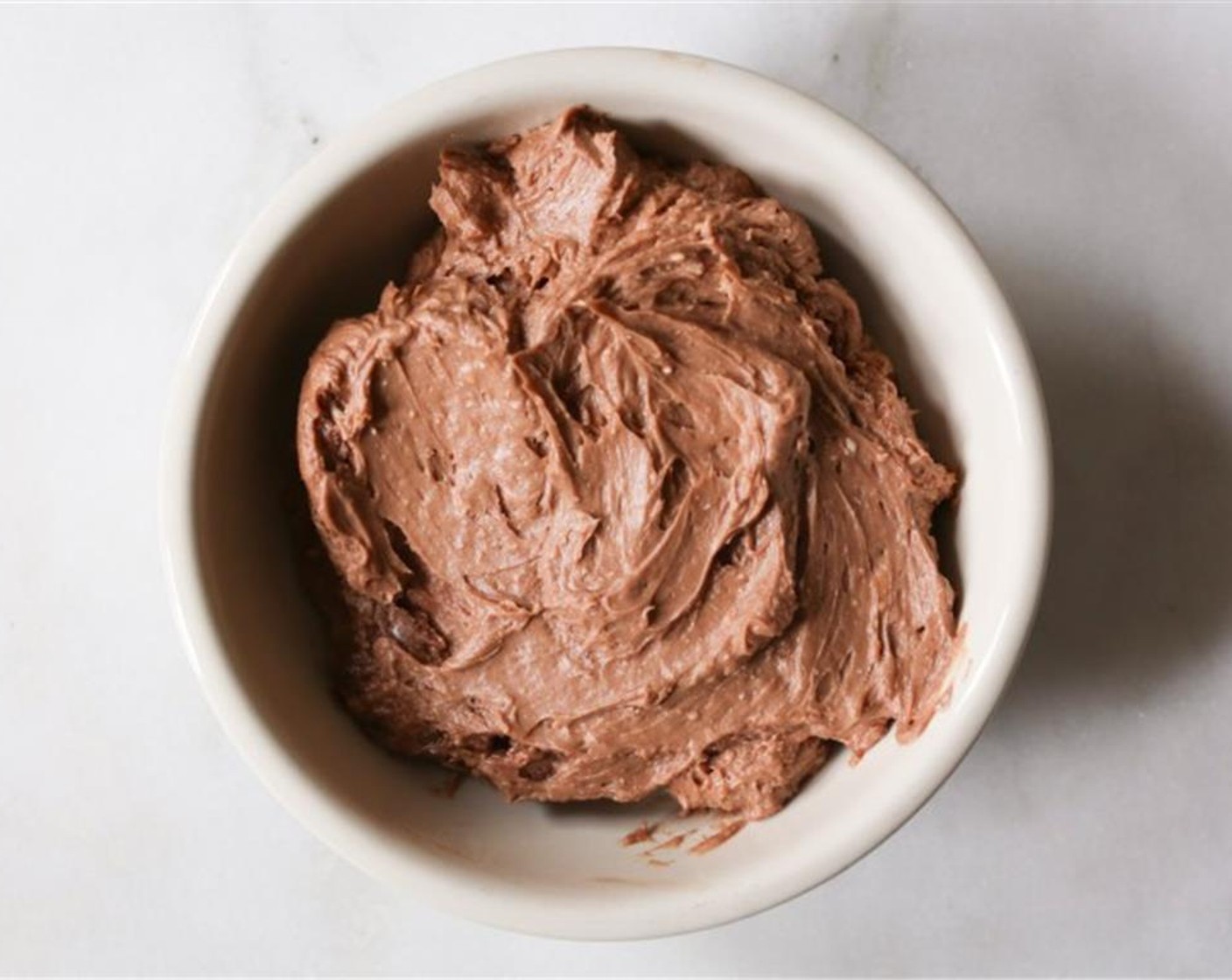 step 1 In a medium mixing bowl, use a hand mixer to combine the Philadelphia Original Soft Cheese (1 cup) and Nutella® (1/2 cup) until silky smooth.