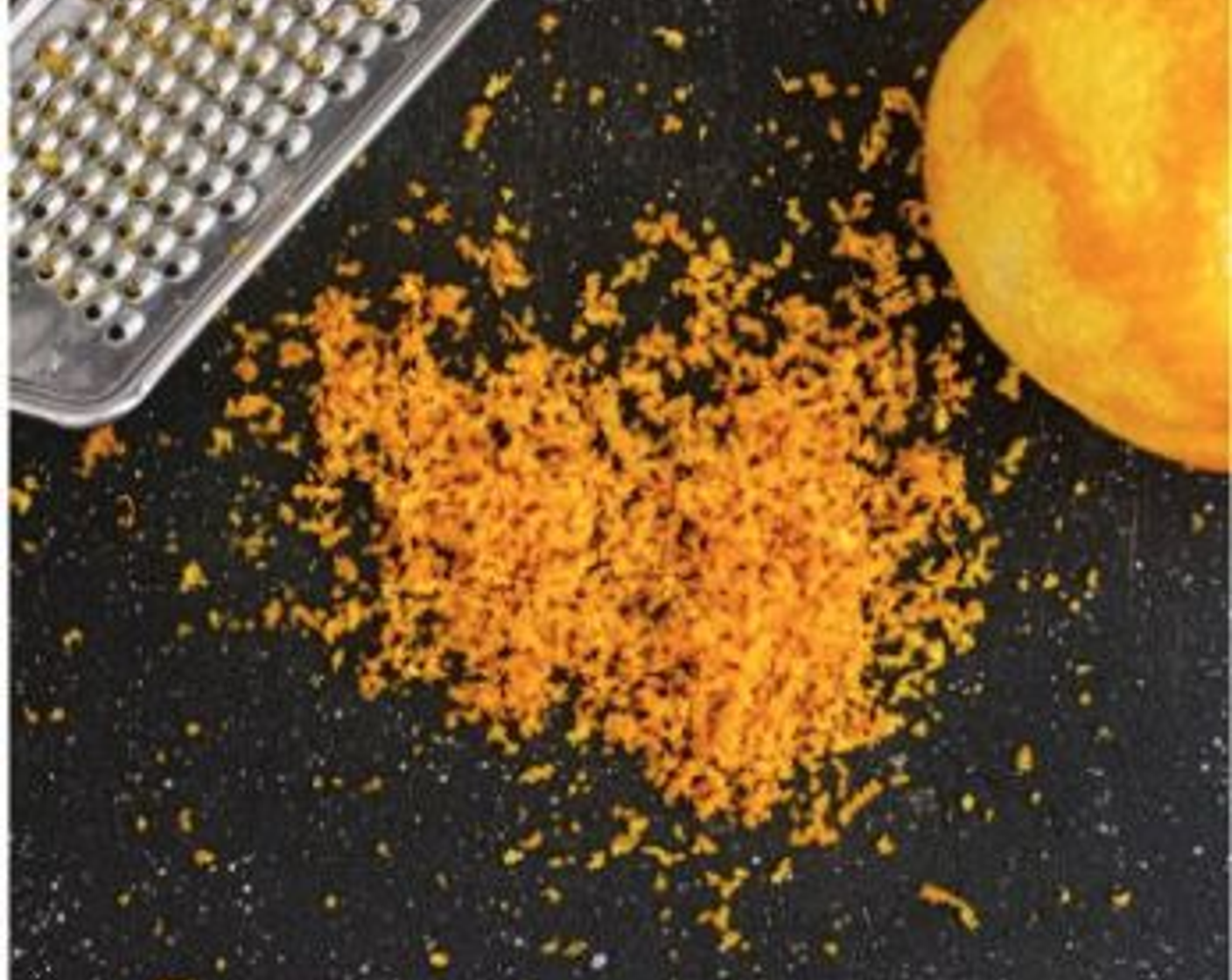 step 2 First orange: Grate the zest from half. You will need 1 teaspoon of zest.