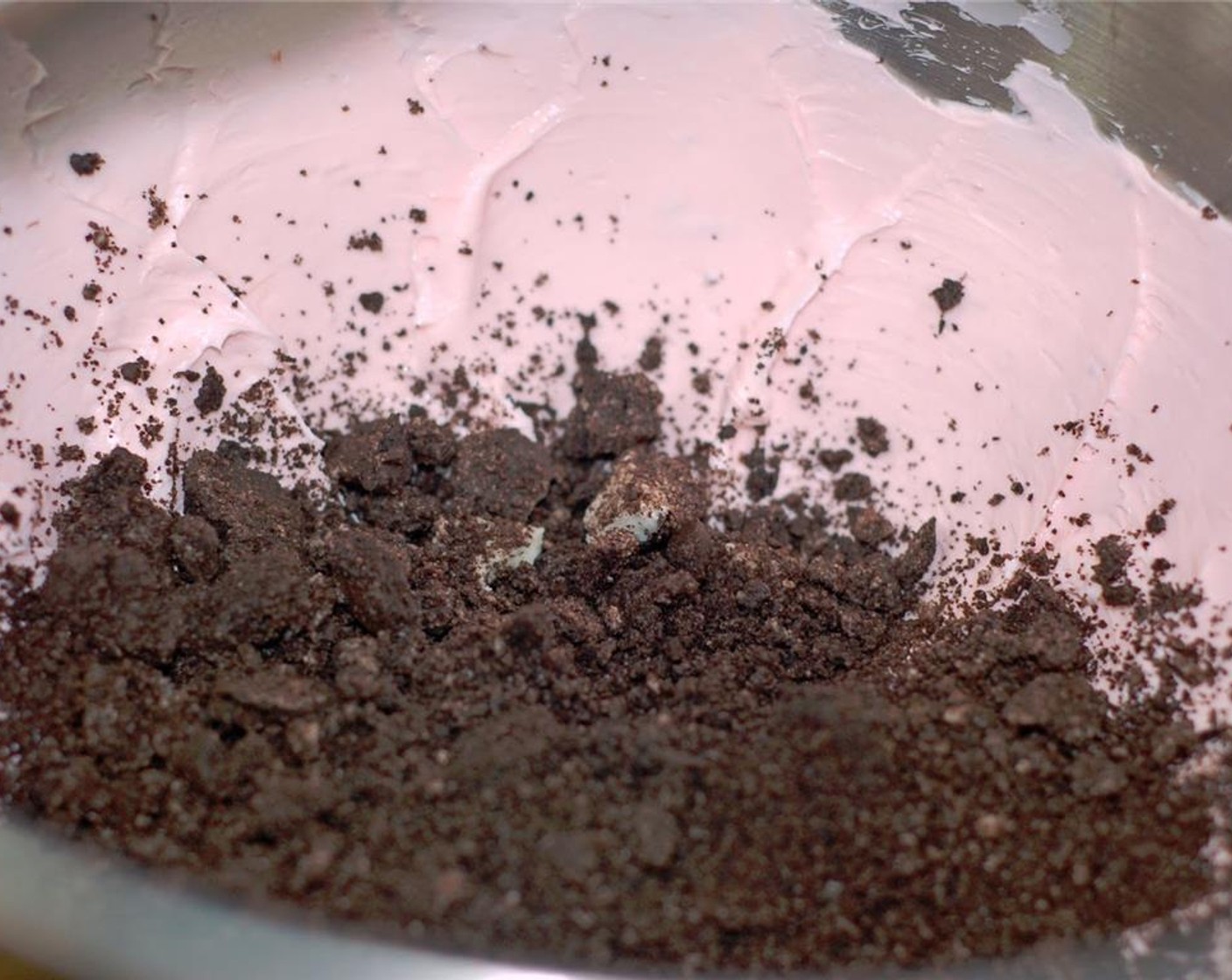 step 2 In a stand mixer or using a hand mixer, beat the Strawberry Cream Cheese (1 cup) until soft. Then add the crushed Oreos a little at a time until well incorporated and the mixture becomes a dough like consistency.