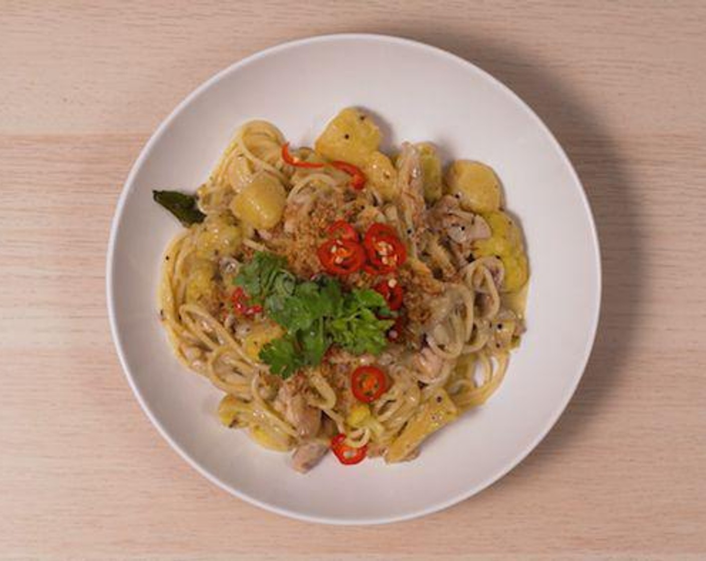 step 3 Divide pasta into 4 portions. Garnish with Fresh Cilantro (1 1/4 cups), Chili Pepper (1 Tbsp), and Fried Shallots (1 Tbsp) before serving.