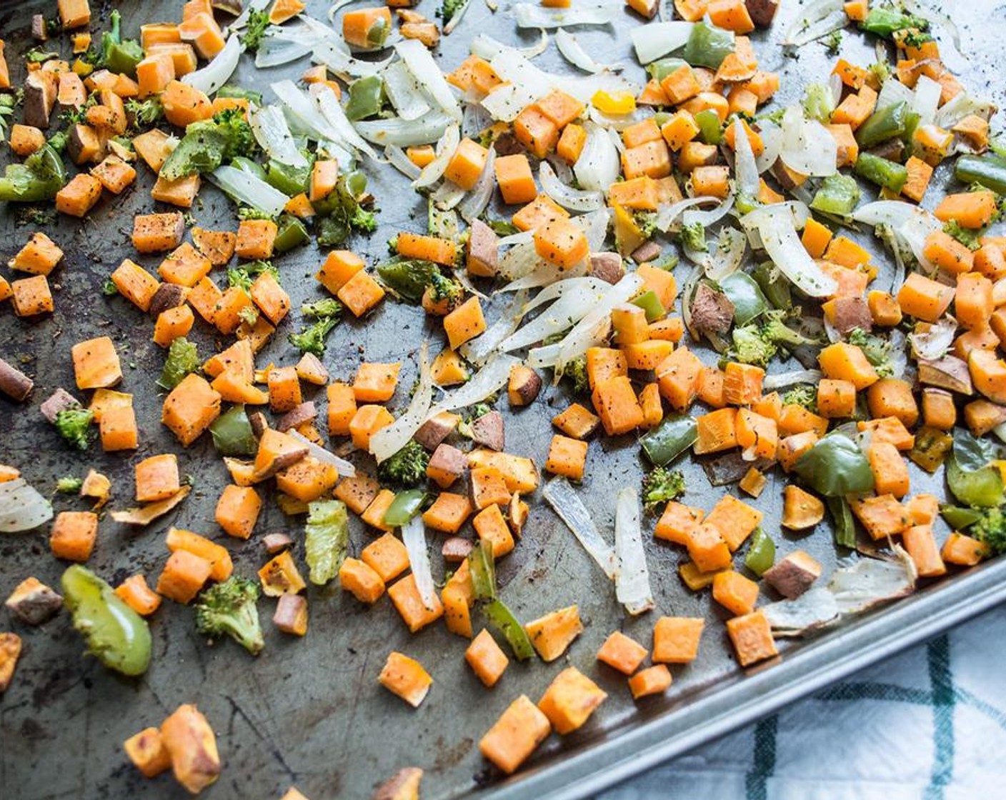 step 4 Lay veggies out in a single layer on the baking sheet and roast for 10 minutes.