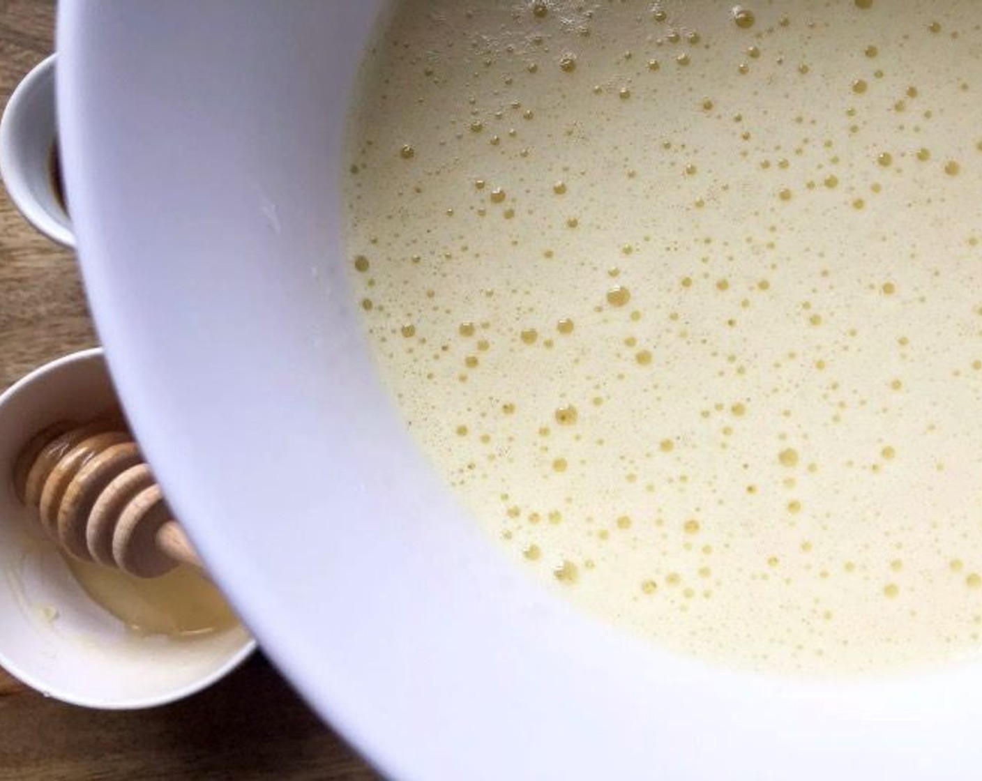 step 3 In a medium bowl, beat the Farmhouse Eggs® Large Brown Eggs (6) and Honey (1/3 cup) together until pale and fluffy. Add in Coconut Oil (1/3 cup), Almond Milk (4 Tbsp), and Pure Vanilla Extract (2 tsp) and beat until well combined.