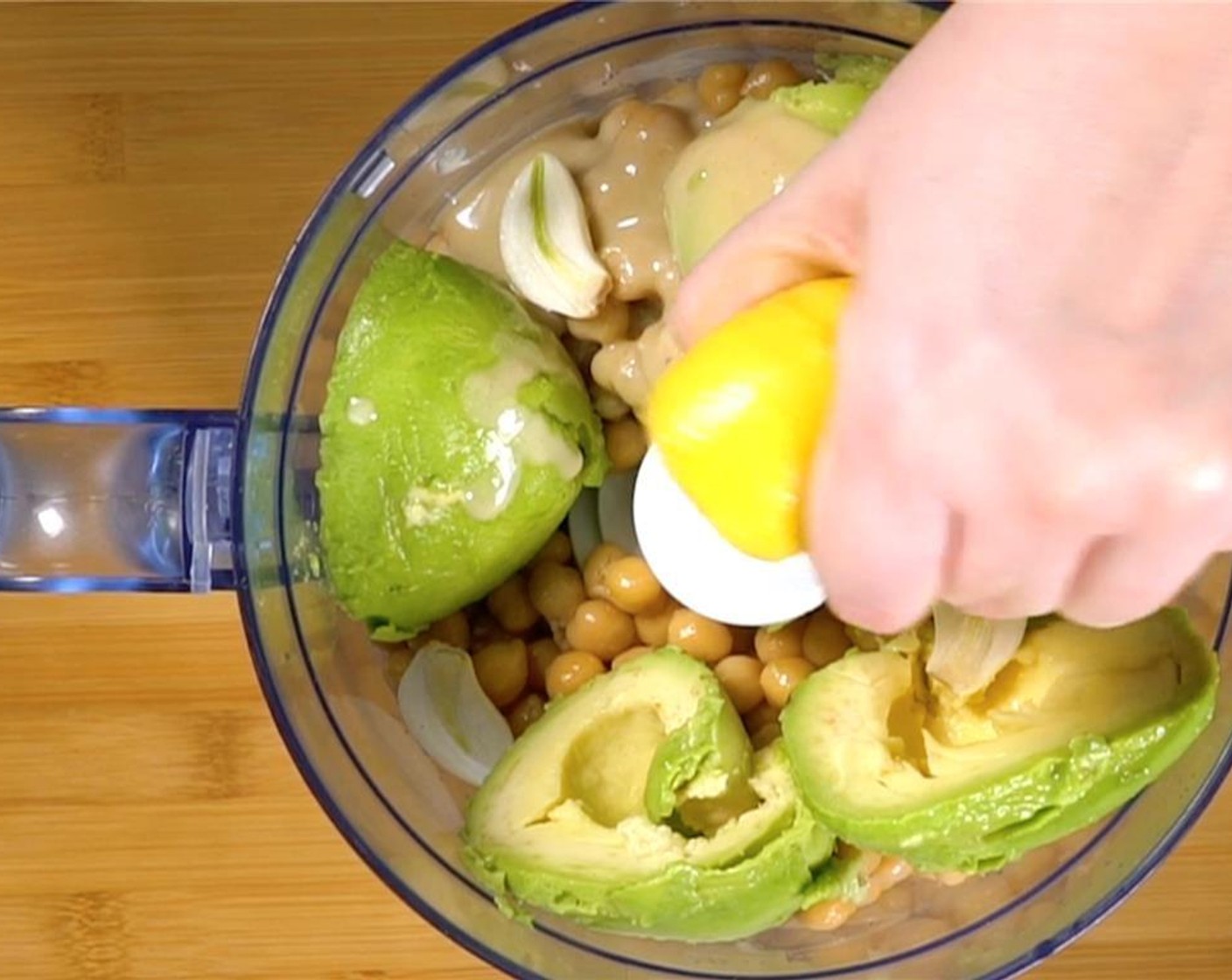 step 8 Add Tahini (2 Tbsp), Garlic (4 cloves), and squeeze inLemons (to taste).