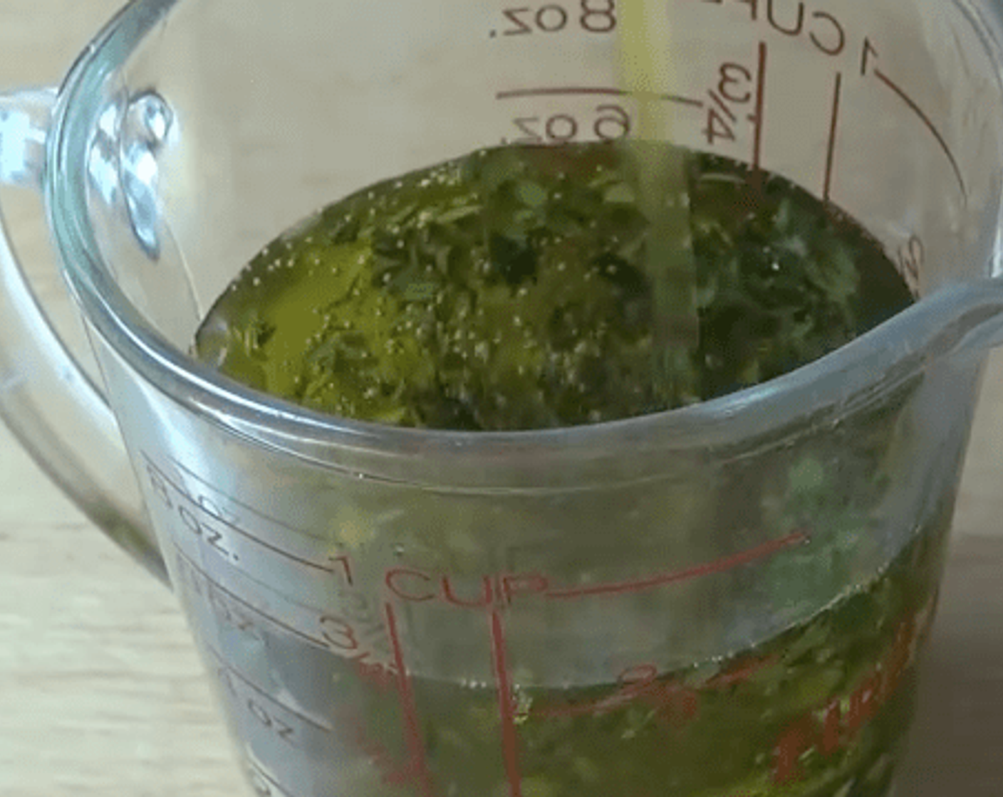 step 1 Add Extra-Virgin Olive Oil (1 cup), Garlic (1 clove), and Fresh Thyme (2 tsp) in a measuring cup. Give that a good stir so everything mixes together. Set them aside.