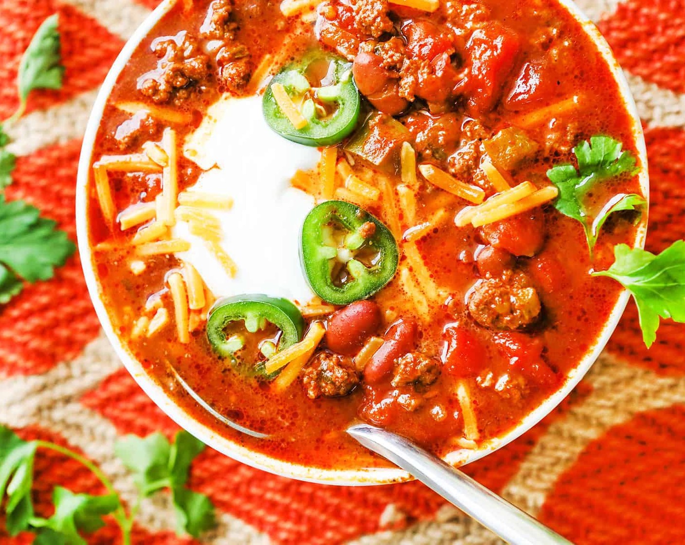 step 5 On the stovetop, bring to a boil, dial back to medium-low and simmer for 2 hours (stir occasionally). In a slow cooker, cook on low for 7 to 8 hours. Serve warm with Shredded Cheese (to taste) and Sour Cream (to taste).