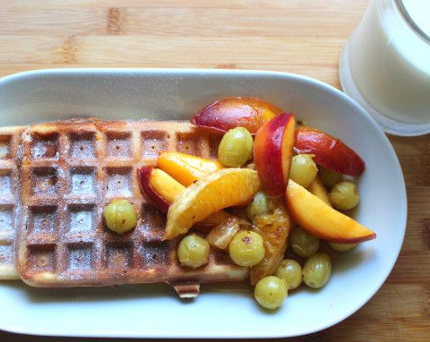 step 7 Serve the waffles with the caramelized fruits and syrup of your choice.