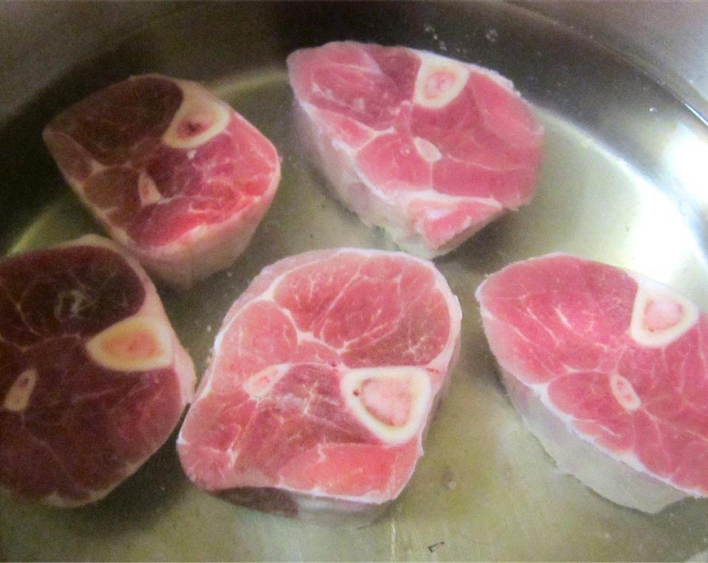 step 1 Simmer Pork Shanks (5) in stock seasoned with Star Anise (to taste), Simply Organic Cinnamon, Ground (to taste), Garlic Paste (to taste), Salt (to taste), Ground Black Pepper (to taste), and grated Fresh Ginger (to taste) until tender but NOT falling apart.