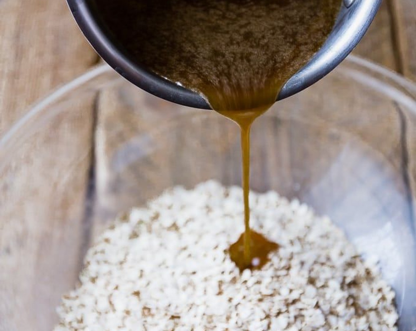 step 2 Melt the Butter (4 oz) with the Brown Sugar (1/2 cup) and Golden Syrup (3 Tbsp), then stir in the Old Fashioned Rolled Oats (2 1/2 cups) and mix thoroughly.