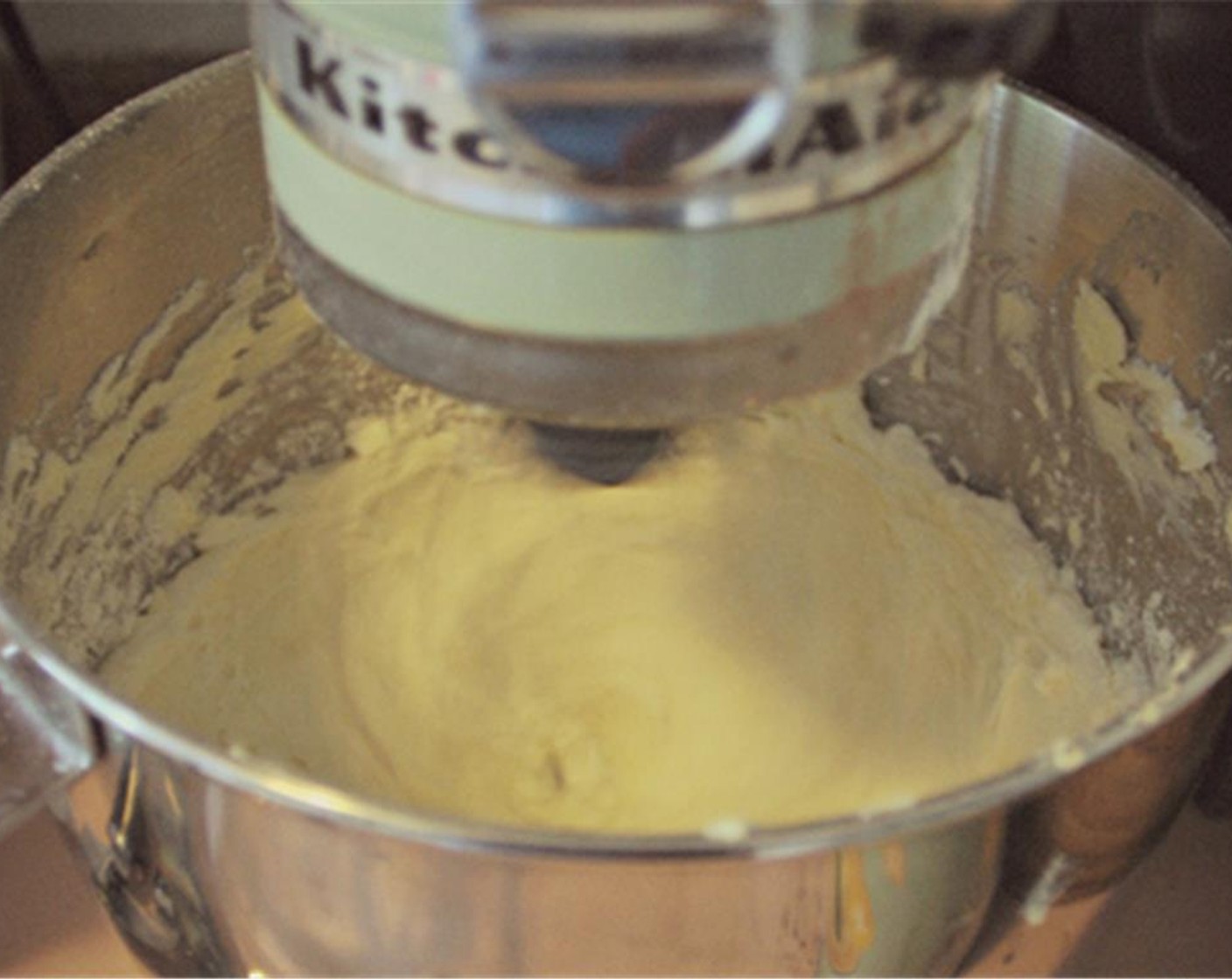 step 8 For frosting, beat softened vegan butter in the bowl of an electric stand mixer. Add Powdered Confectioners Sugar (3 1/2 cups) slowly and then mix on high for 3 minutes. Add Kahlua (1 Tbsp) and Coconut Milk (1/4 cup)