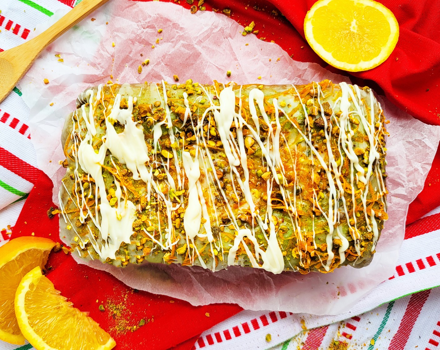 step 7 Evenly drizzle glaze over bread and add some orange zest and Pistachios (3 Tbsp) on top before slicing and serving.