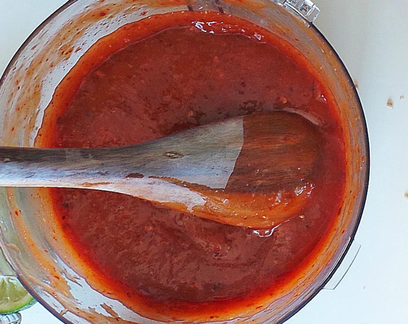 step 2 In a food processor, combine the Ketchup (1 cup), Honey (1/2 cup), Chipotle Peppers in Adobo Sauce (3), Fresh Ginger (1 in), and the juice of the Lime (1) and Orange (1). Save the peels. Then puree until smooth.