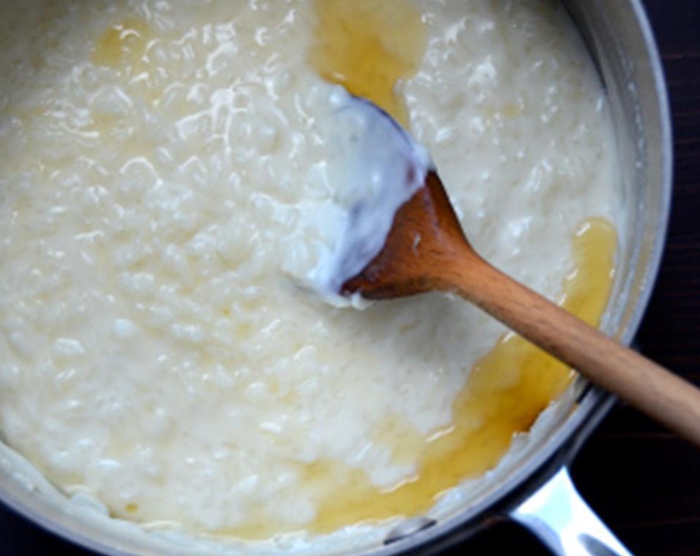 step 2 Stir in Salt (1/4 tsp) and Granulated Sugar (3 Tbsp), and continue to stir until thick and creamy and rice is tender, about 25 to 30 minutes.