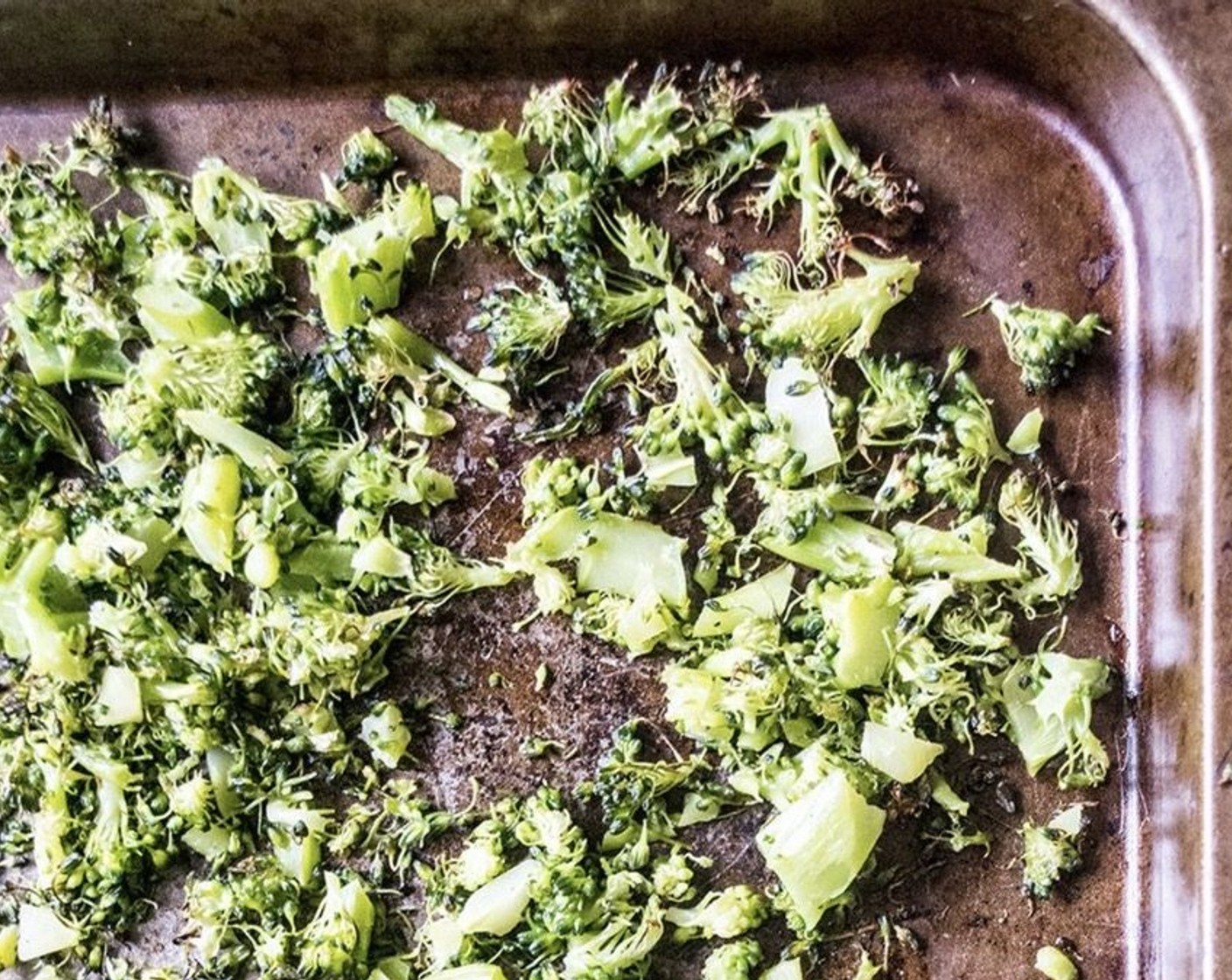 step 2 Add Broccoli (4 cups) to a large bowl, drizzle with Extra-Virgin Olive Oil (1 Tbsp), sprinkle with Salt (to taste) and Ground Black Pepper (to taste), then toss to coat. Spread the broccoli out on a large baking sheet.