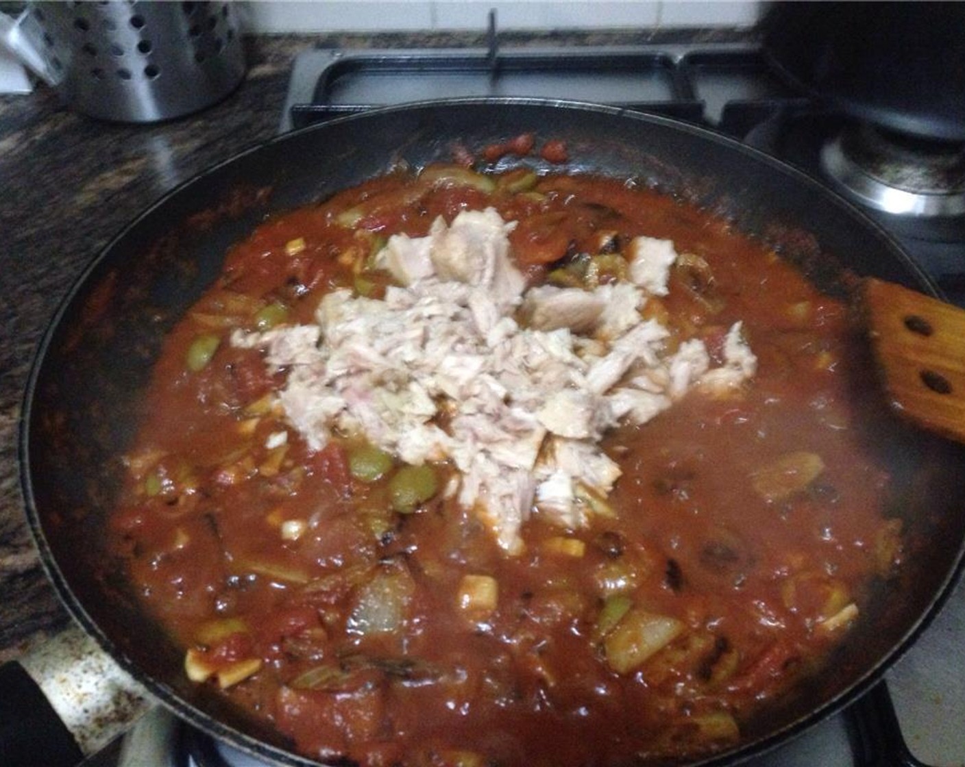 step 6 Drain the Canned Tuna (1/3 cup) and add it to the pan. Simmer for 2 minutes until the tuna is heated and the tomatoes have started to melt.