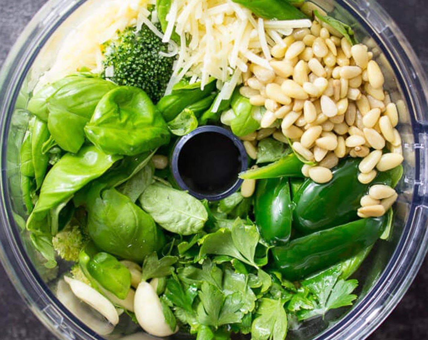 step 1 Add the Broccoli Florets (1 1/3 cups), Fresh Basil Leaves (2 cups), Jalapeño Pepper (1), Garlic (5 cloves), Parmesan Cheese (1/2 cup), Italian Flat-Leaf Parsley (1/4 cup), Pine Nuts (1/4 cup), Salt (1/2 tsp), Lemon (1) and Olive Oil (3/4 cup) to a food processor.