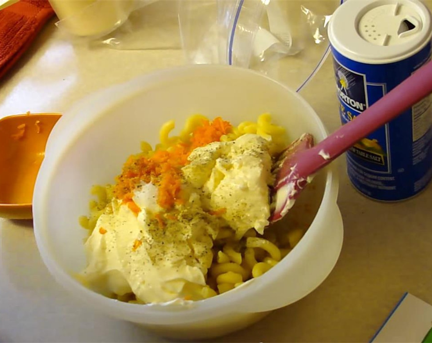 step 2 In a large bowl, combine the cooled elbow macaroni, Mayonnaise (1 cup), Imitation Crab (3 oz), Carrot (1/2 Tbsp), Celery (1 tsp), Onion (1 tsp), Salt (1/2 tsp), Ground Black Pepper (1/4 tsp), Granulated Sugar (1/4 tsp), and Hondashi (1/8 tsp). Mix well, and refrigerate for 4 hours.