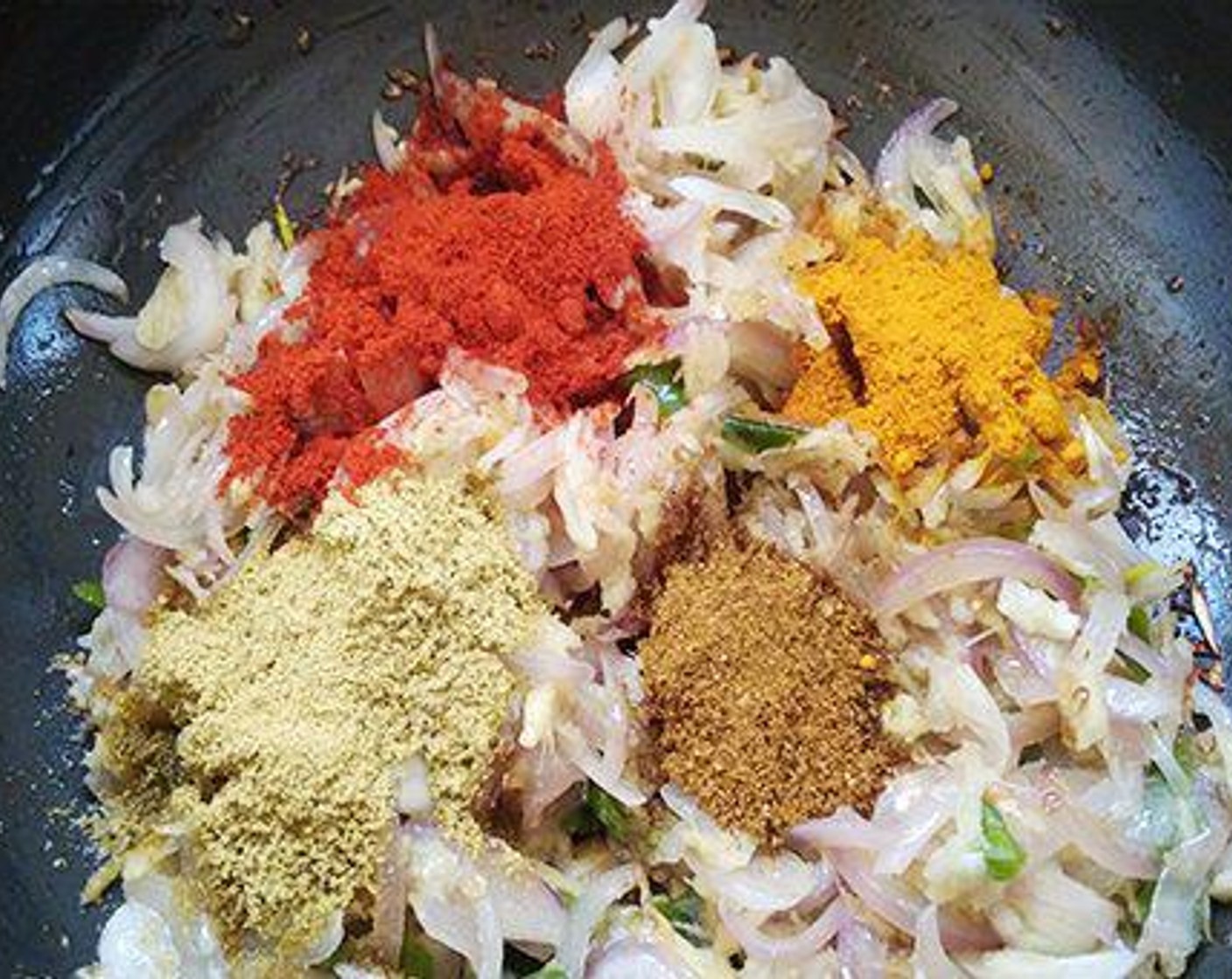 step 2 Sauté for a few minutes and add Chili Powder (1 tsp), Ground Turmeric (1/2 tsp), Garam Masala (1/2 tsp) and Fennel Seeds (1/2 tsp). Sauté until the smell of the spices is gone. Now add Tomatoes (2) and Salt (to taste).