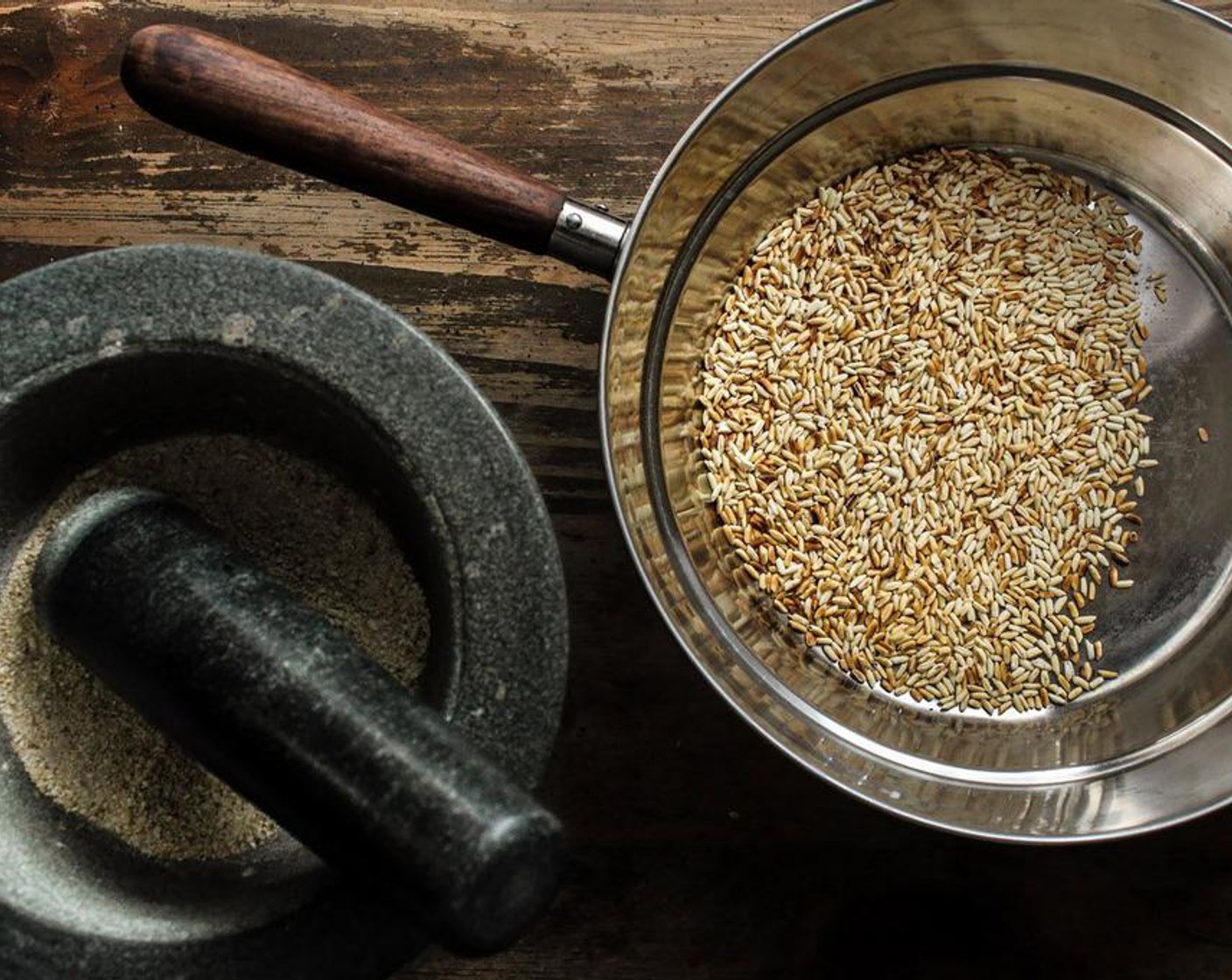 step 2 Once the rice has been toasted, let it cool and grind it to a medium powder with a mortar and pestle or food processor and set it aside.