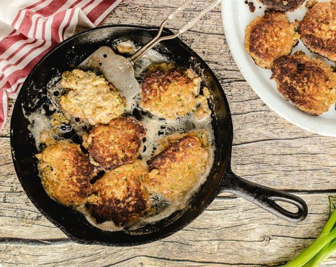 step 4 Spoon a heaping tablespoon of the salmon mixture into the pan to make the patties. Flip when brown on one side.