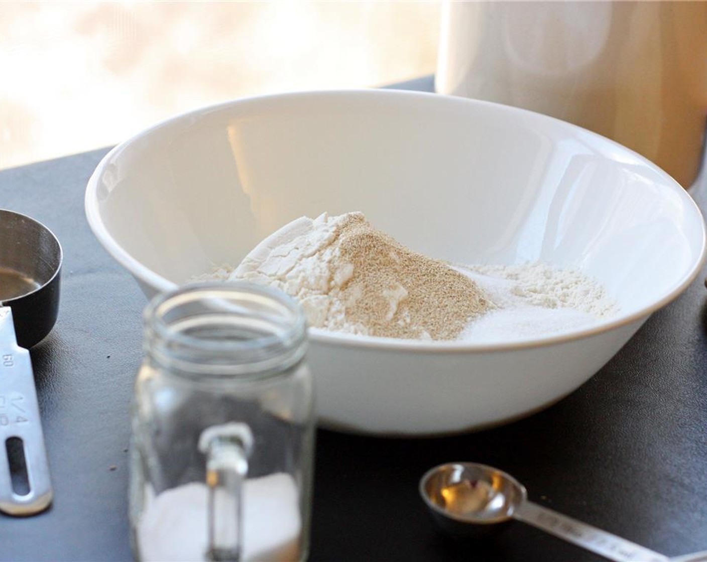 step 3 Sift together the All-Purpose Flour (1 1/2 cups), Granulated Sugar (1 Tbsp), Instant Dry Yeast (1/2 Tbsp), and Salt (1/2 tsp) into a large bowl.