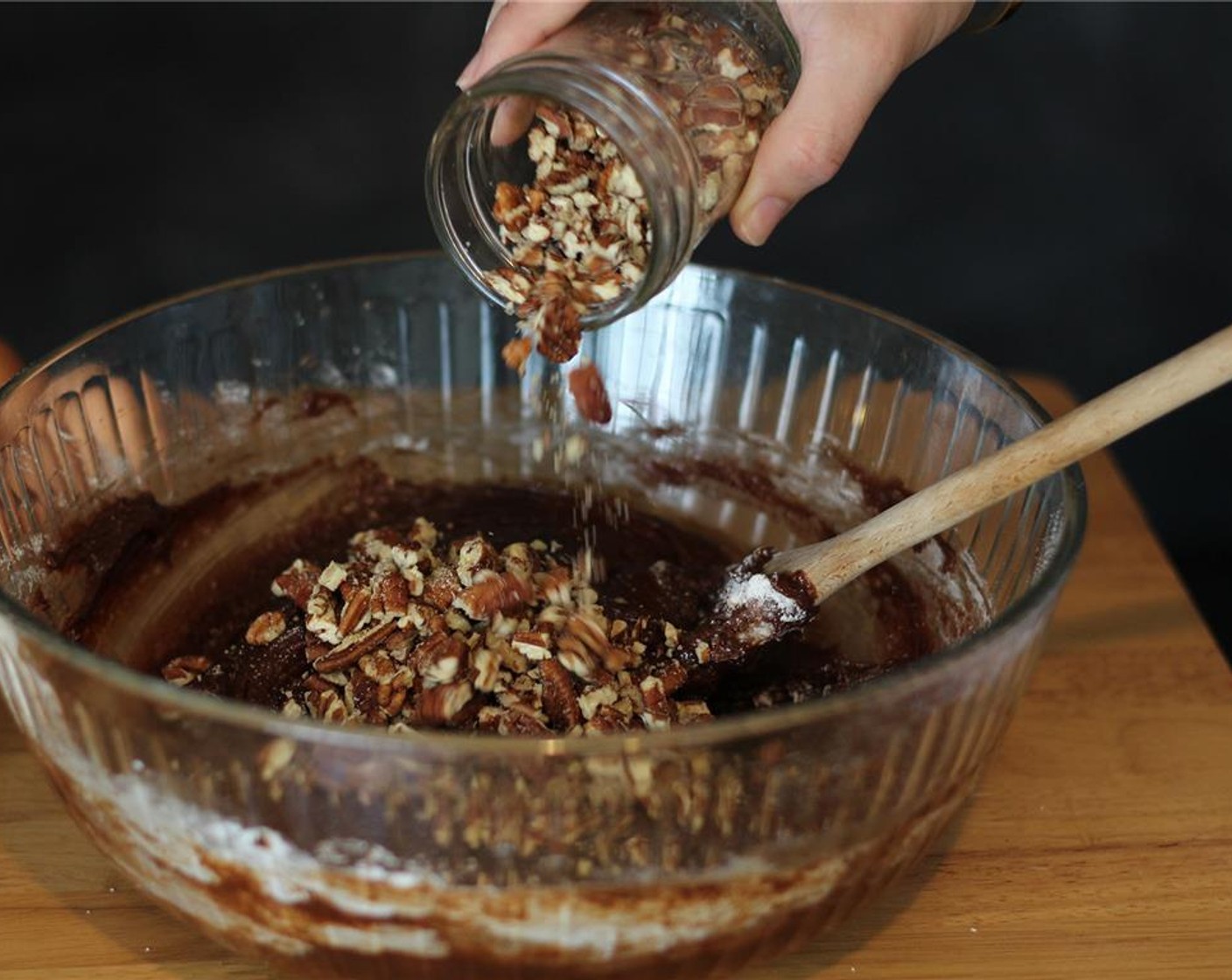 step 4 Whisk in the Eggs (3). Gently stir the All-Purpose Flour (1 cup) into the mixture. Once it's almost all incorporated, stir in the Chopped Pecans (3/4 cup).